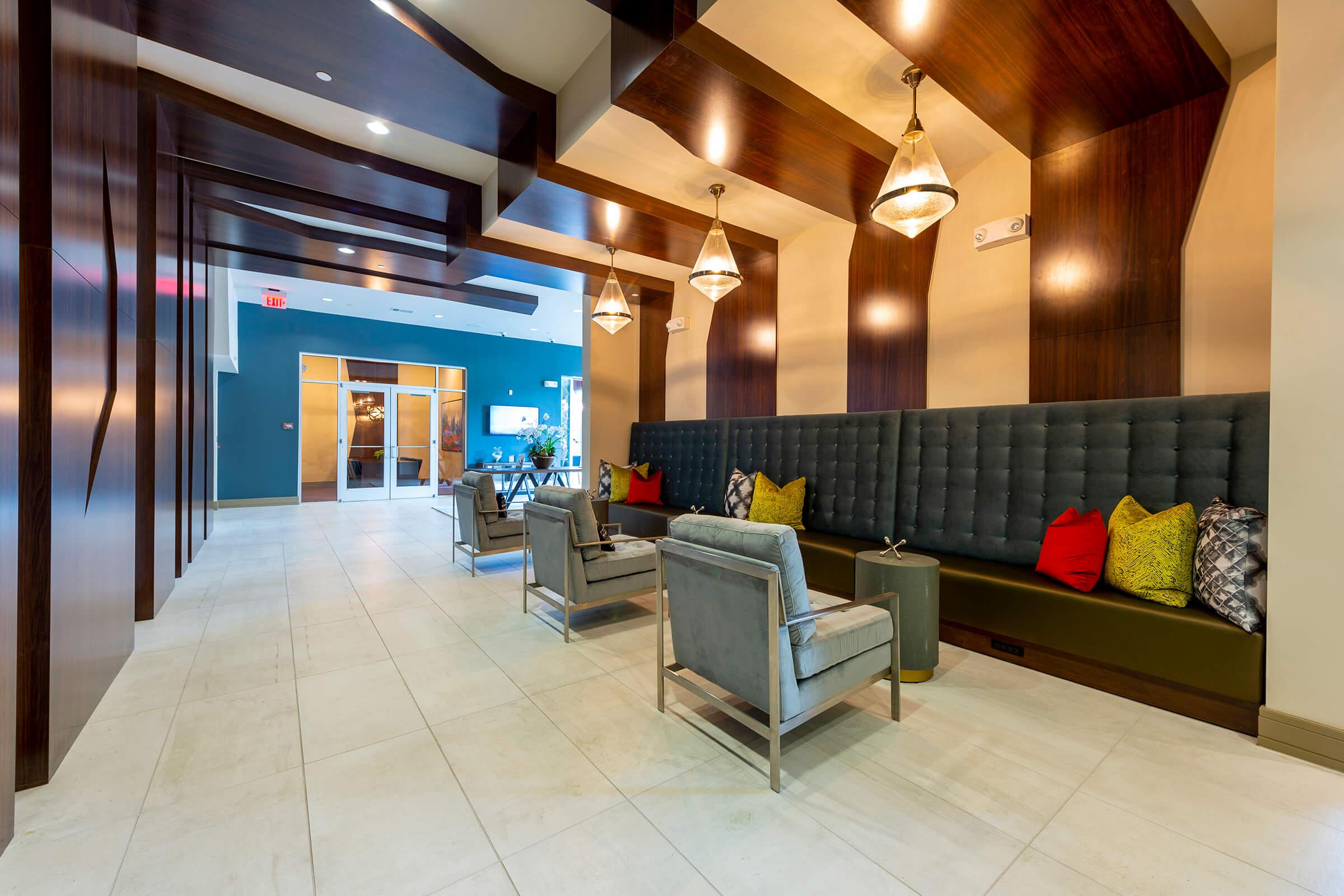 a room filled with furniture and a large window