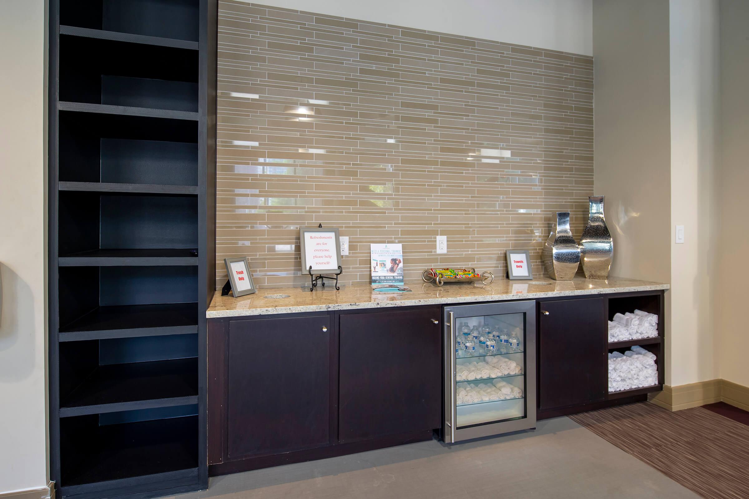 a stainless steel refrigerator in a room