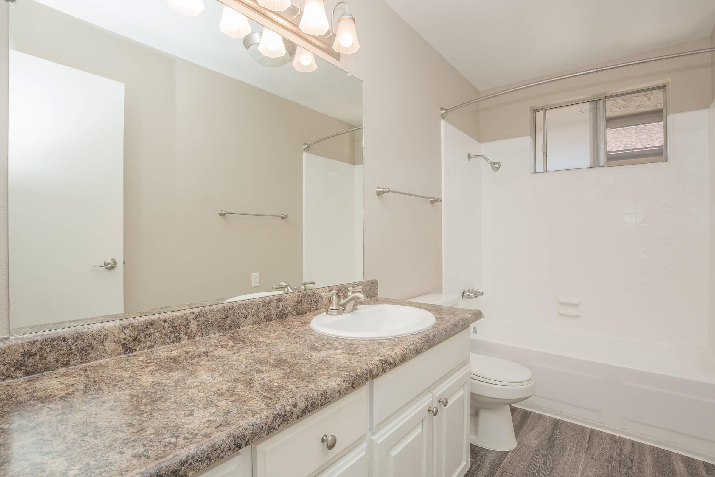 Unfurnished bathroom with wooden floors