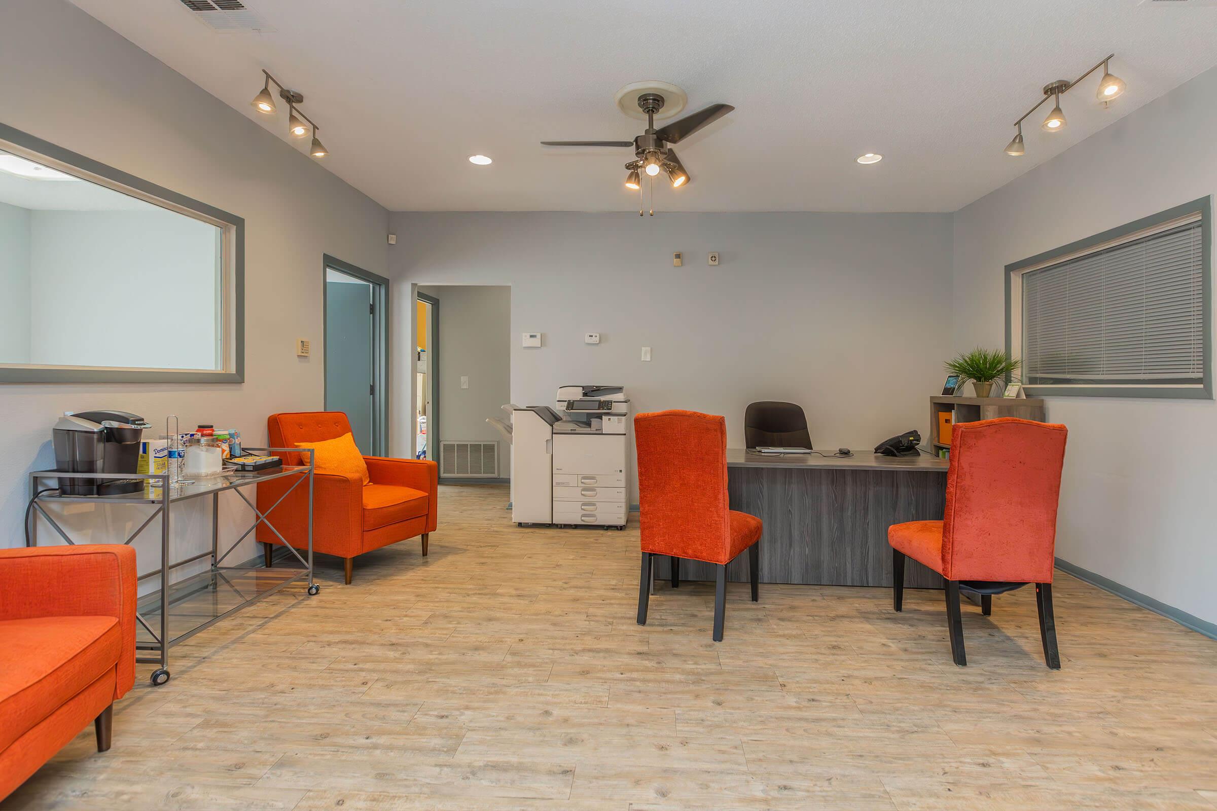 a room filled with furniture and a rug