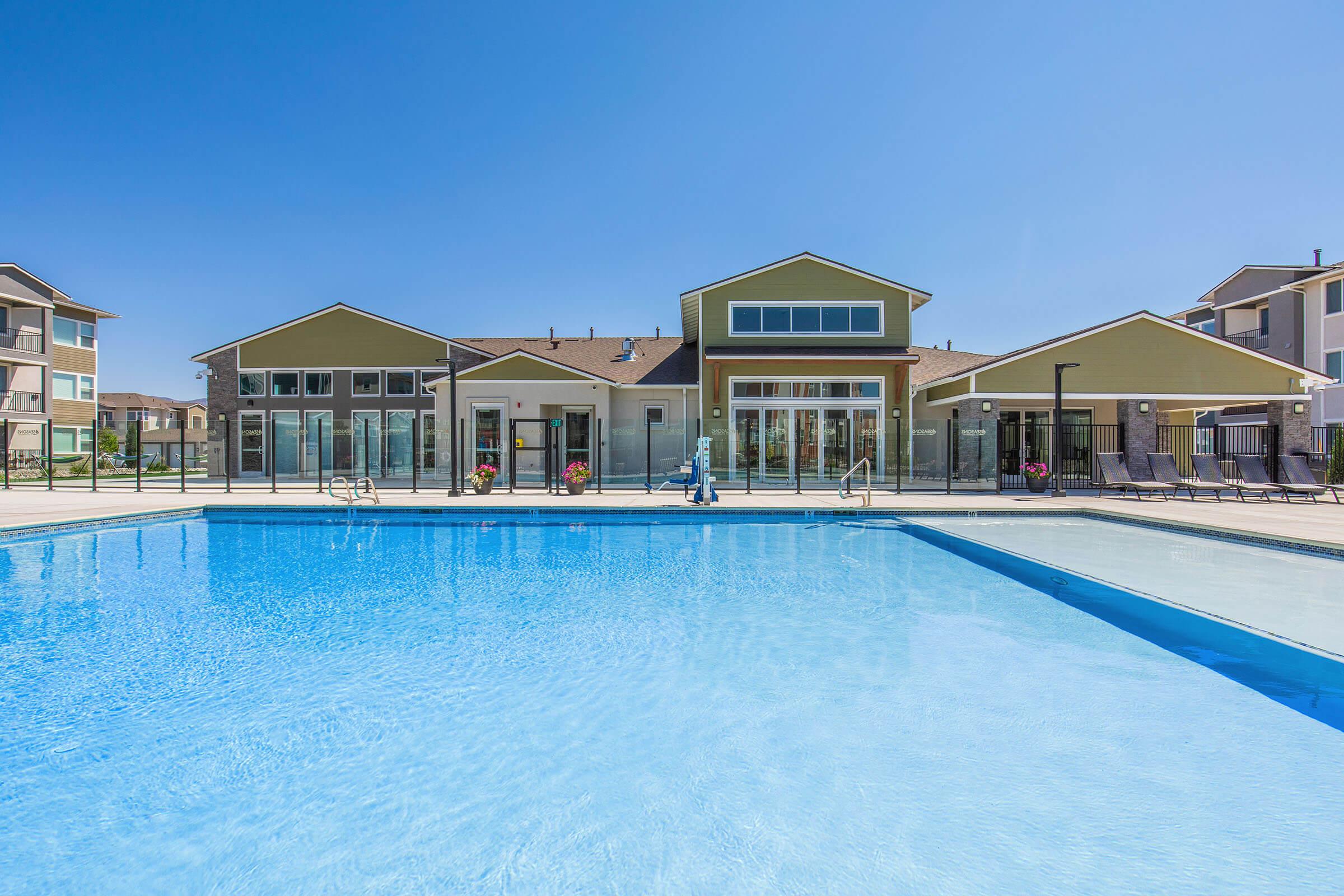 a house with a large pool of water