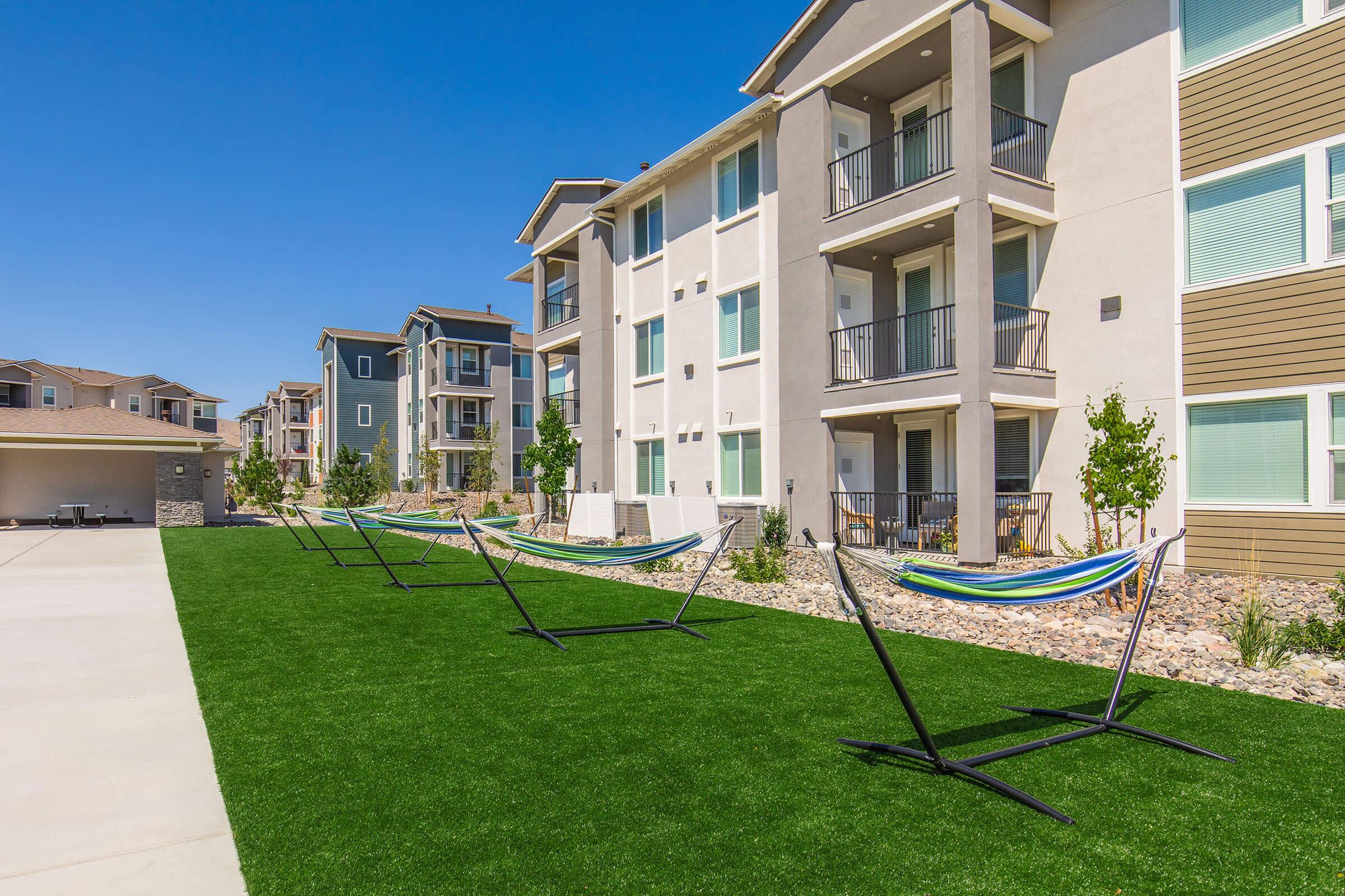 a large lawn in front of a building