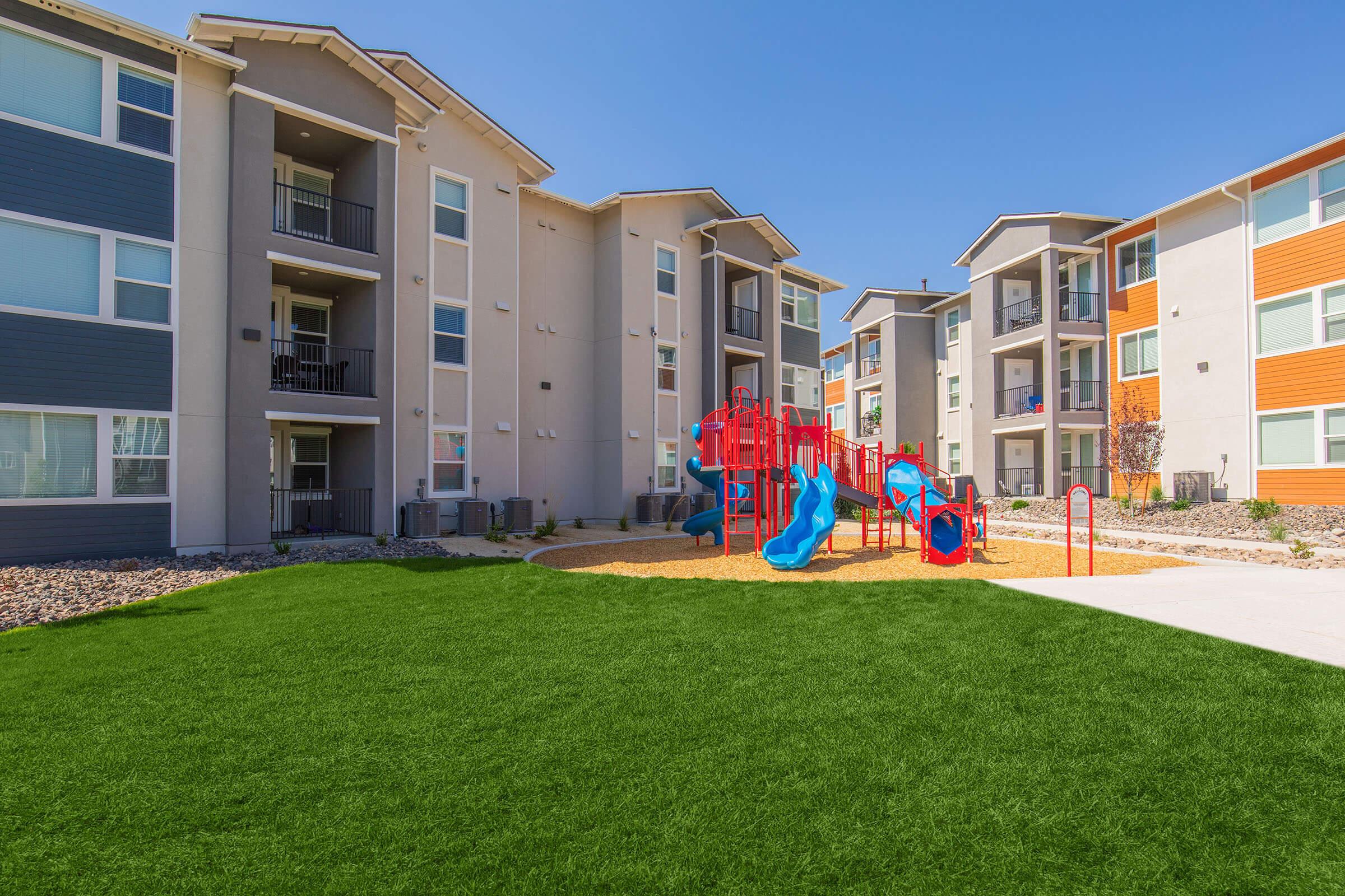 a large lawn in front of a building