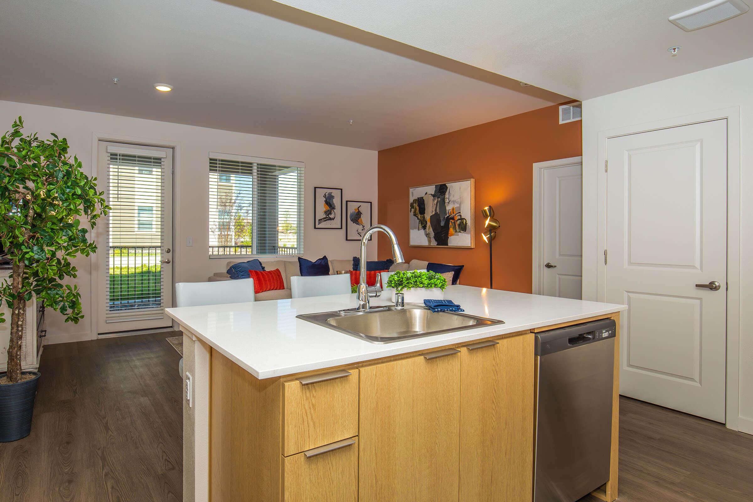 a kitchen with a sink and a window