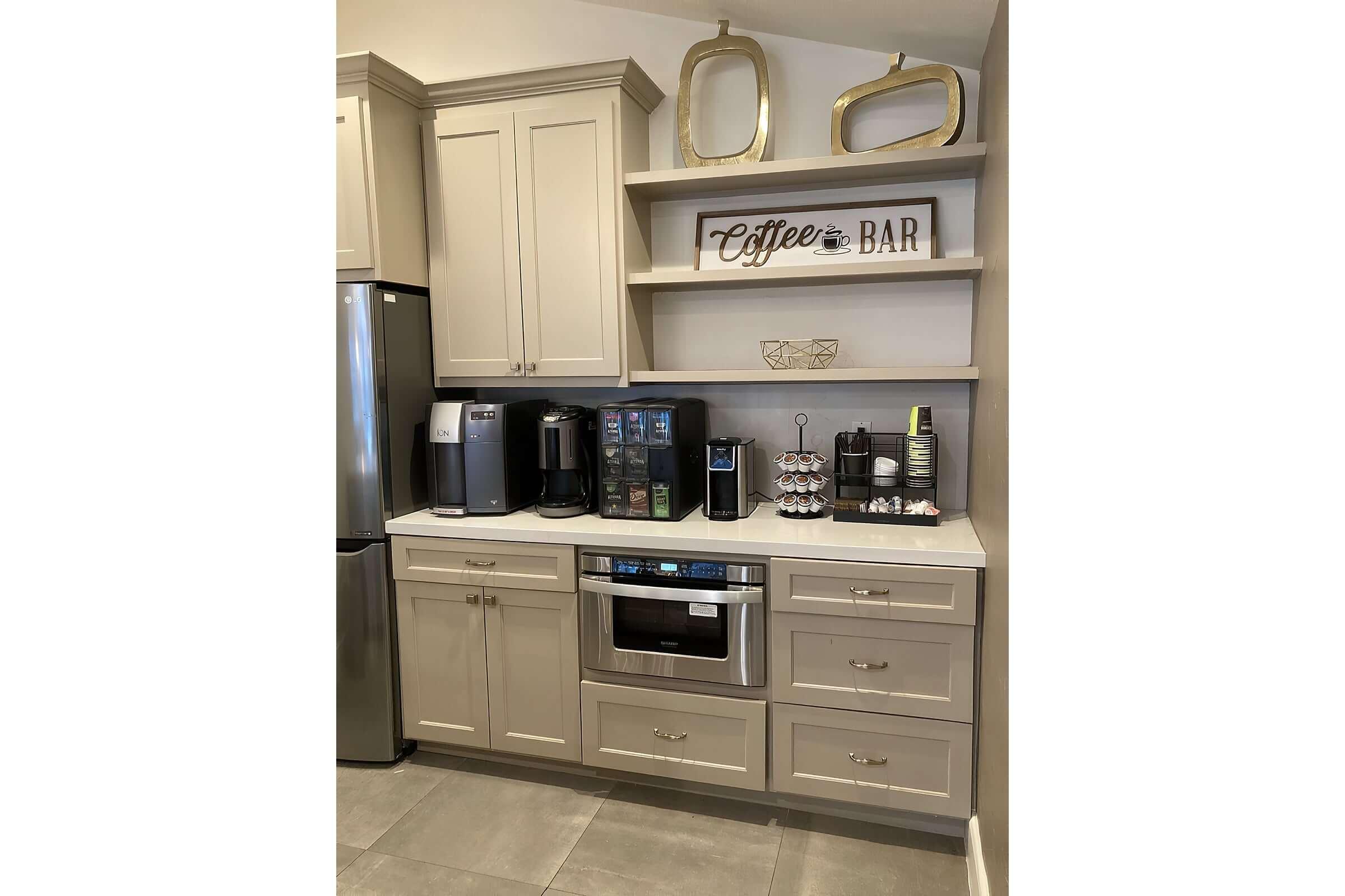 a stove top oven sitting inside of a kitchen