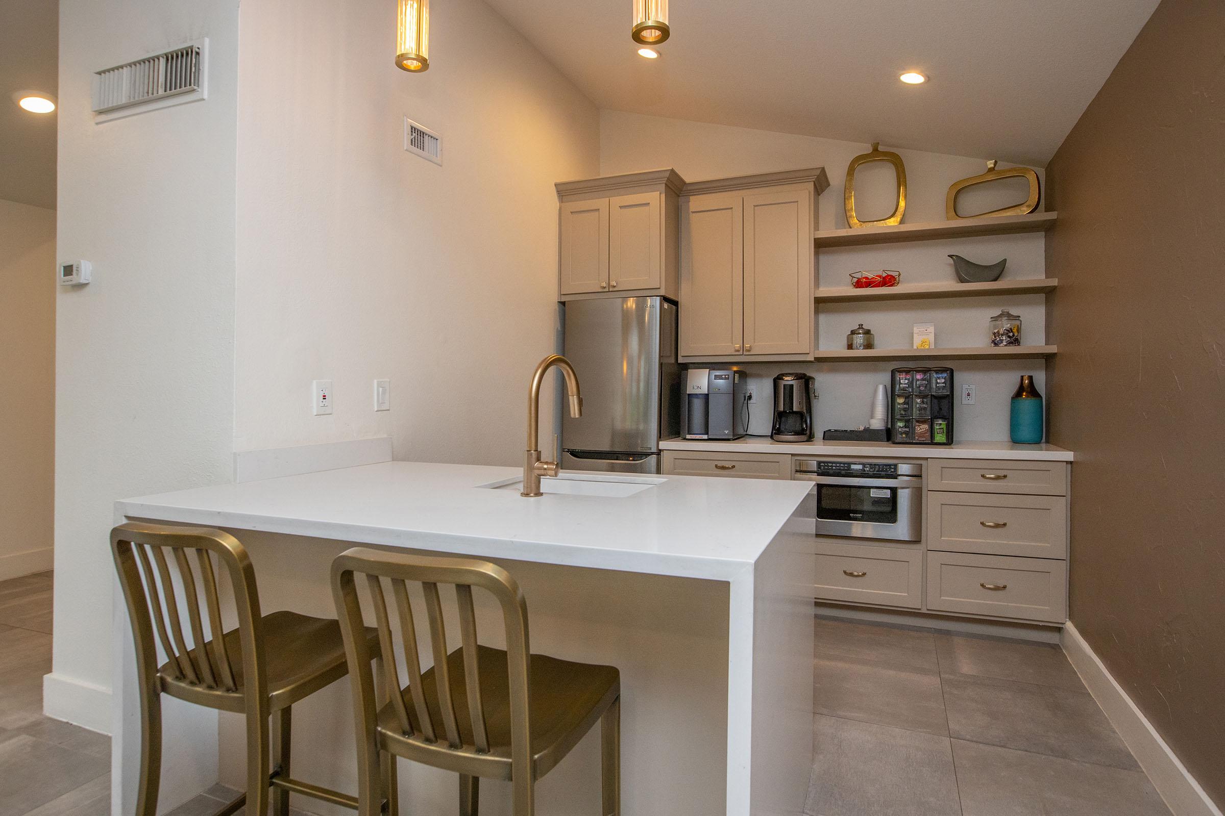 a kitchen with a dining room table