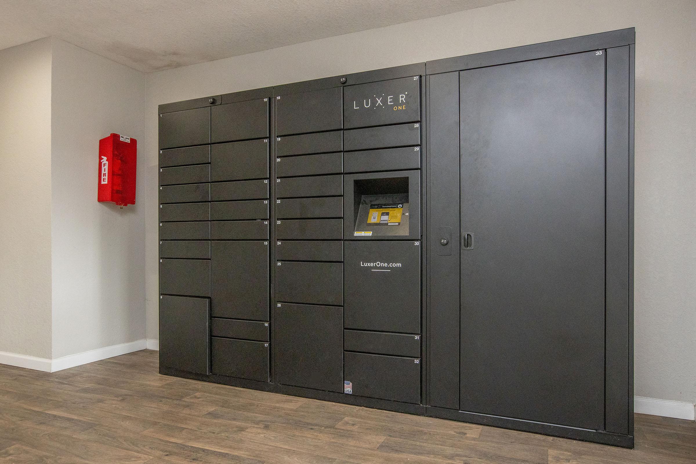 a stainless steel refrigerator in a room