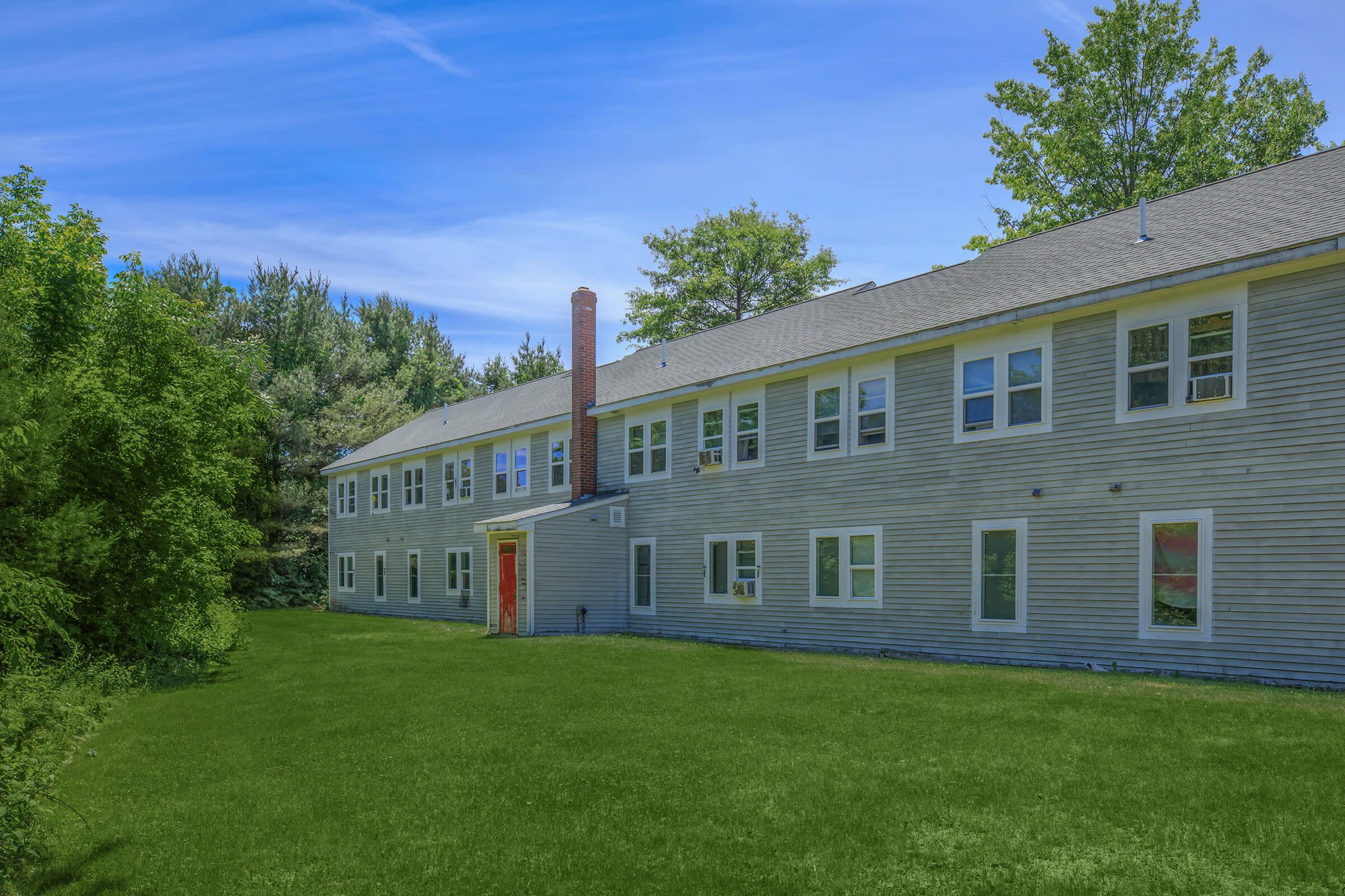 a large lawn in front of a house