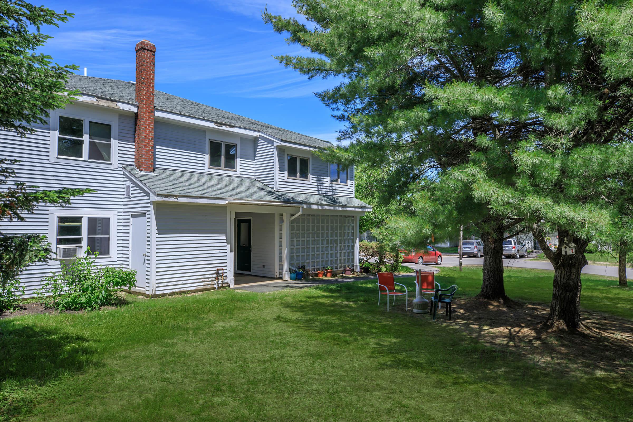 a large lawn in front of a house