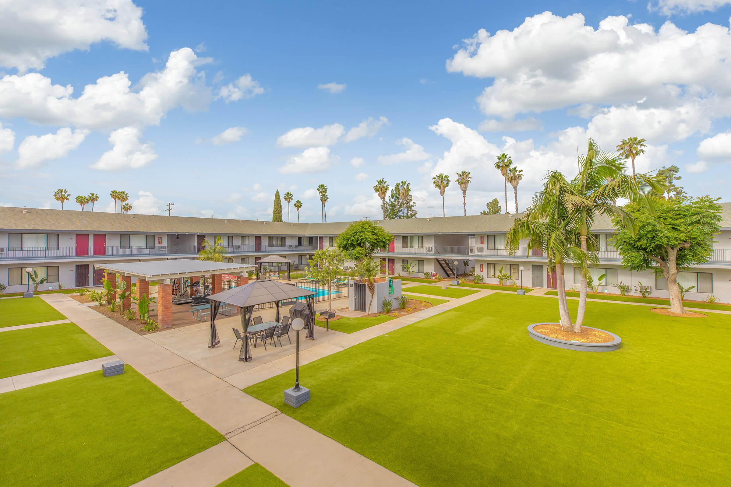 Miramar Apartments courtyard with greenery 