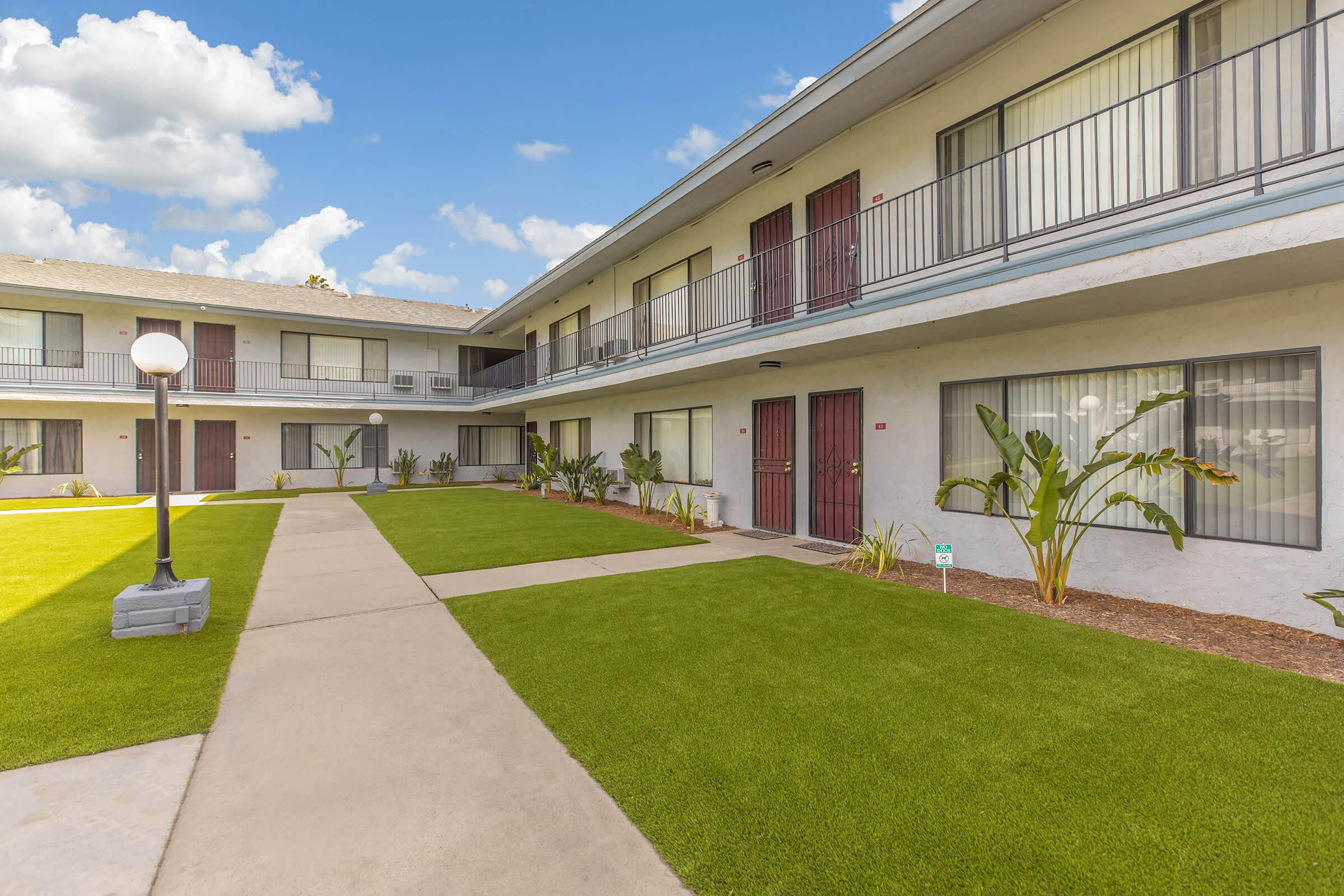 Miramar Apartments community building with street light