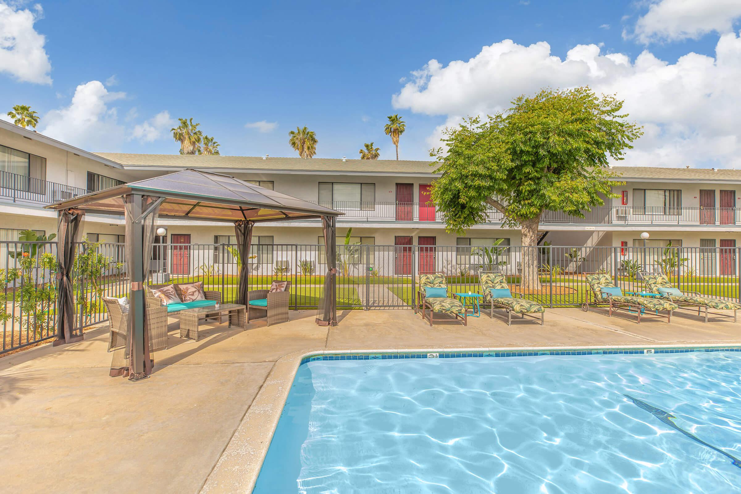 Community pool with chairs