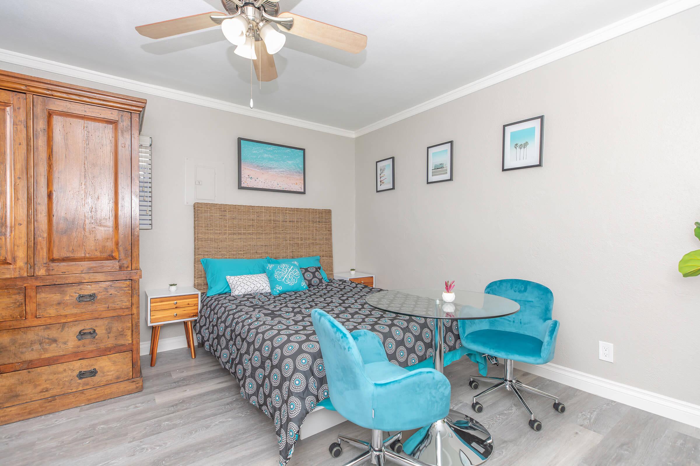 Bedroom and dining room with blue accents