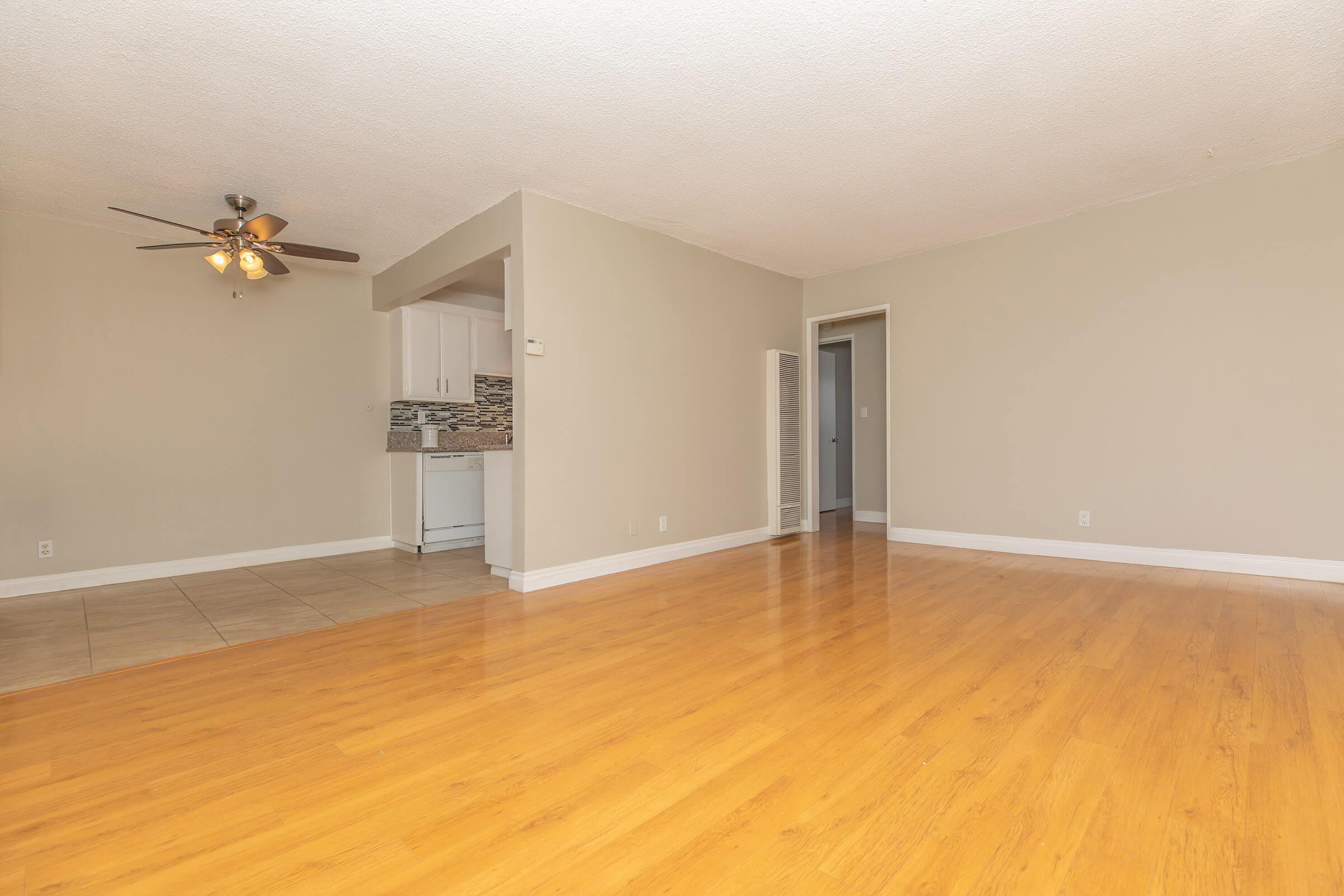 Living room and dining room with wooden floors