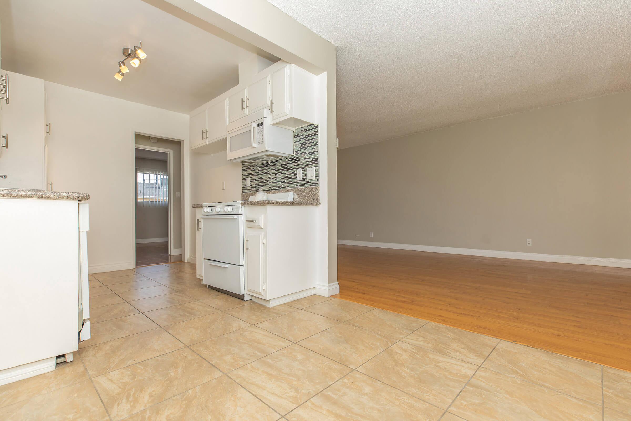 Kitchen and dining room with tile flooring