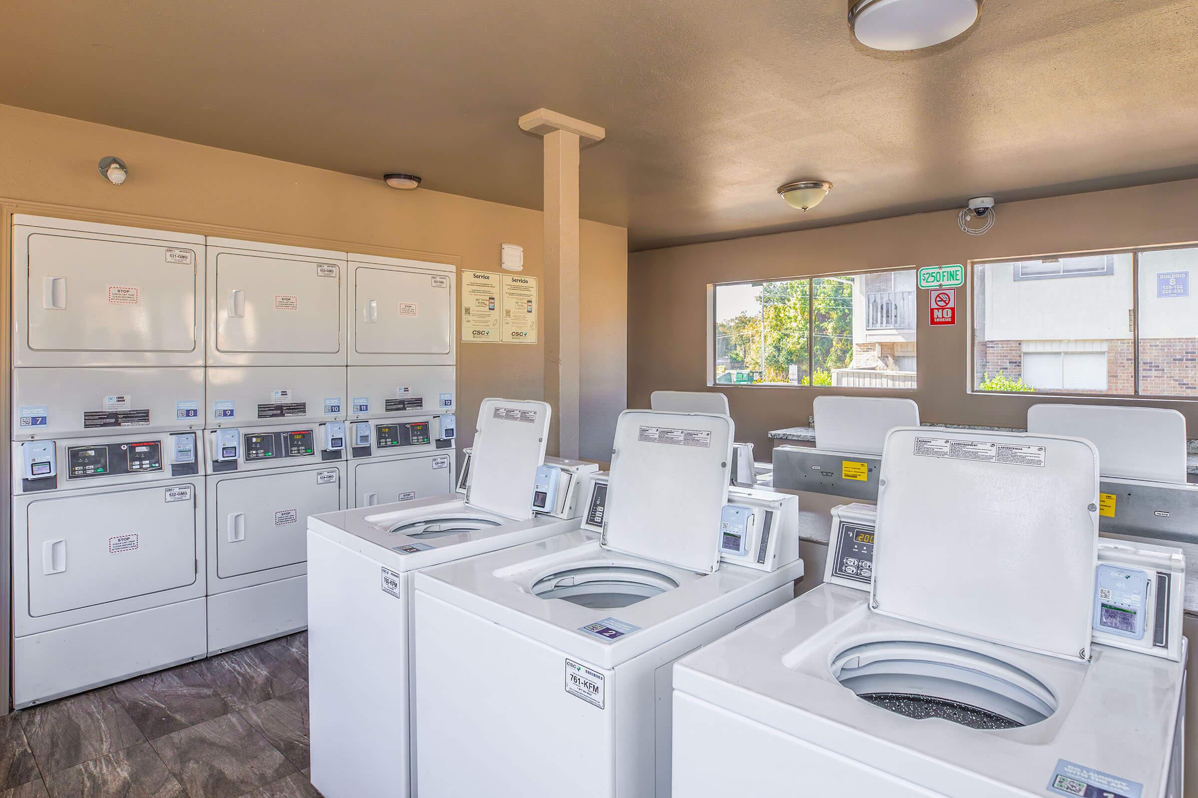 a kitchen with a sink and a refrigerator