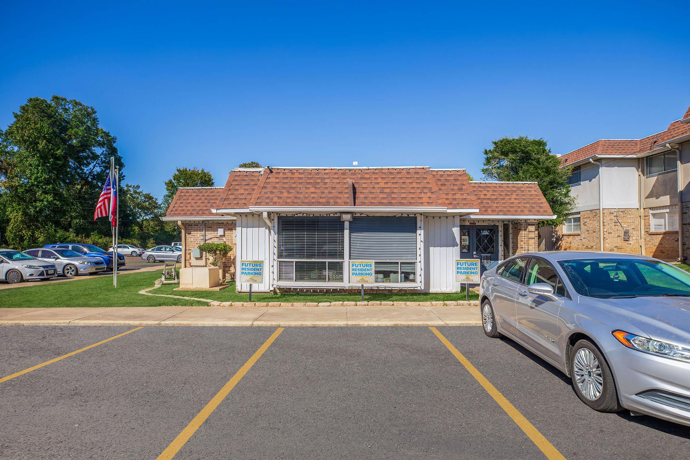 a car parked in front of a house