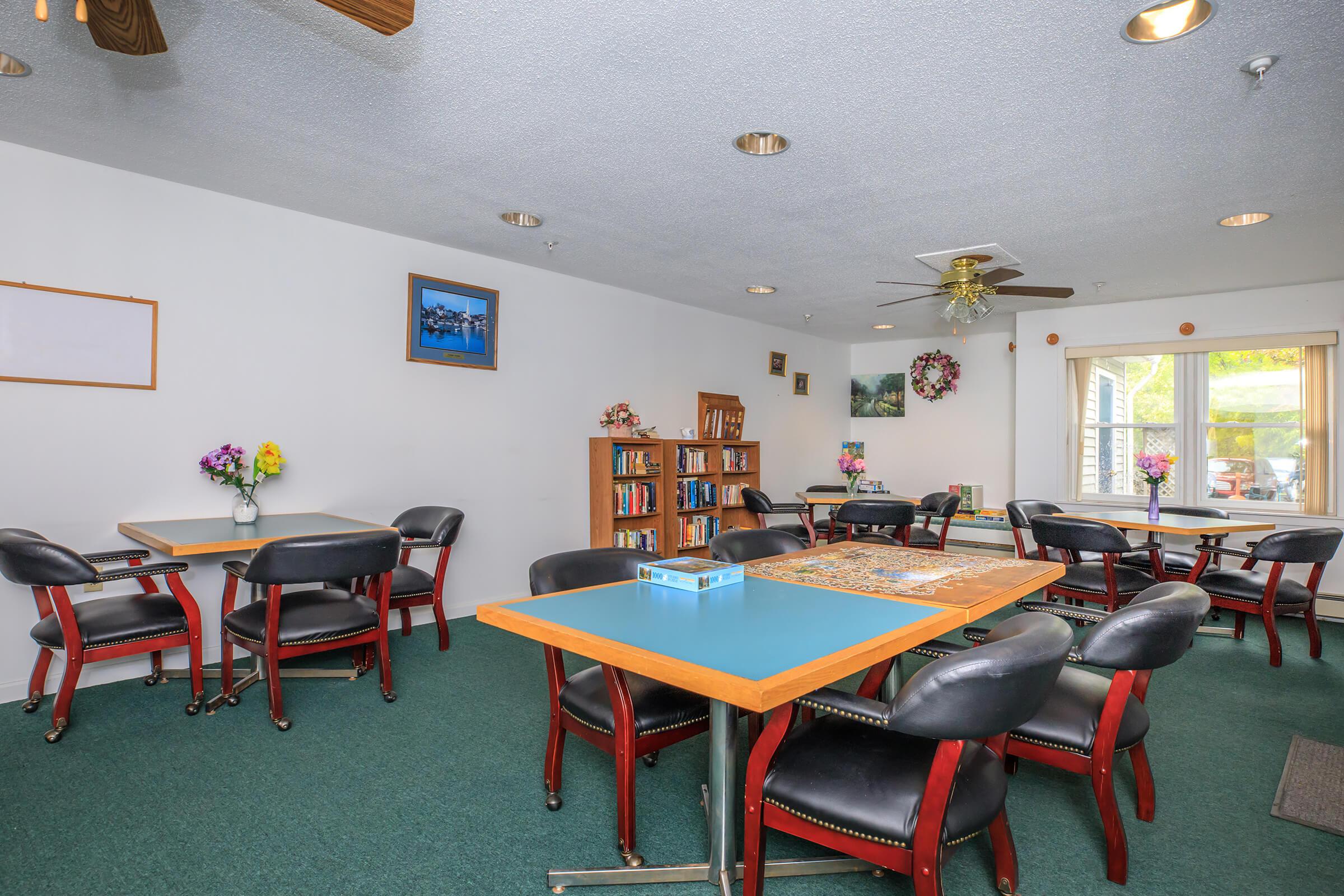 a room filled with furniture and a table