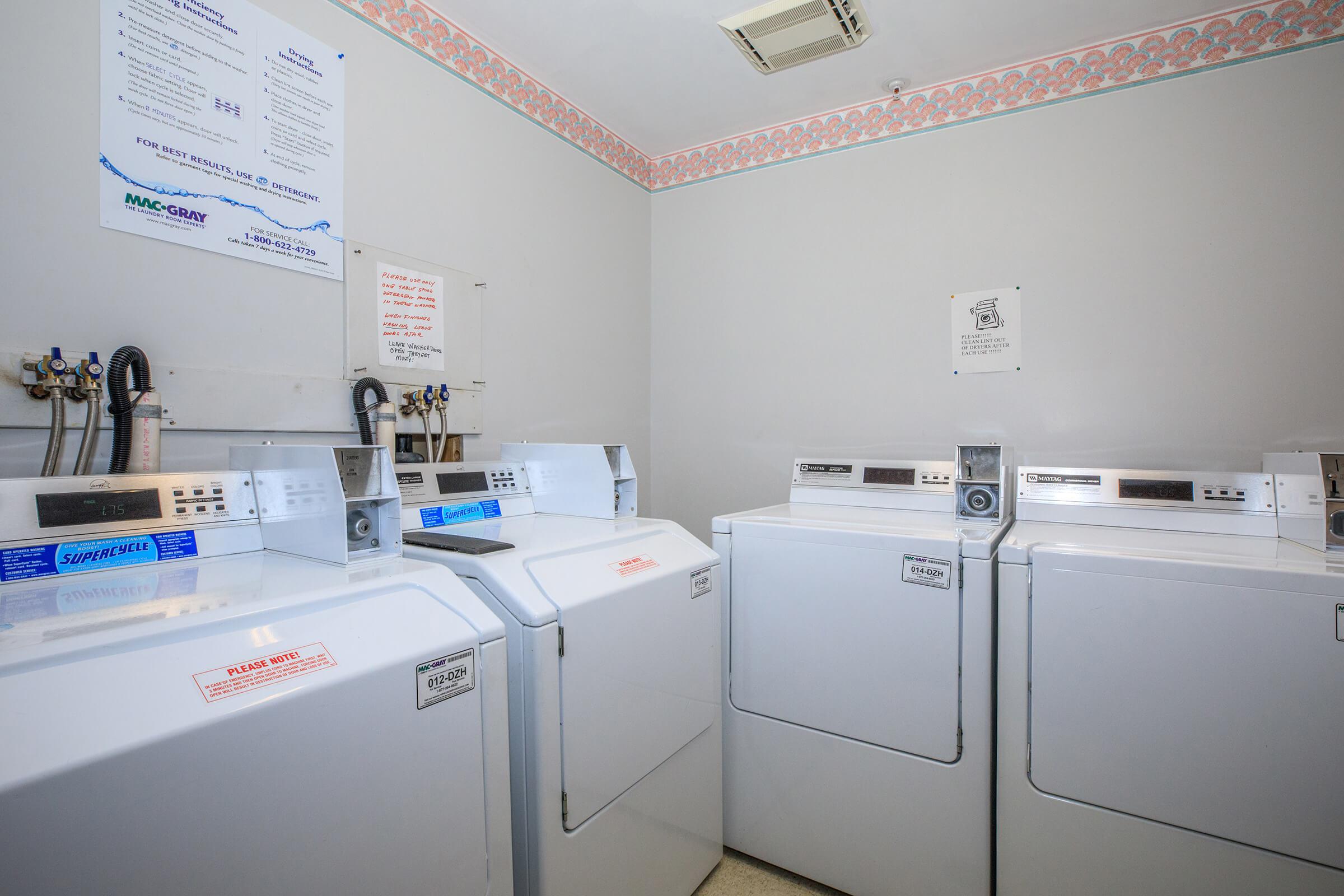 a kitchen with a sink and a refrigerator