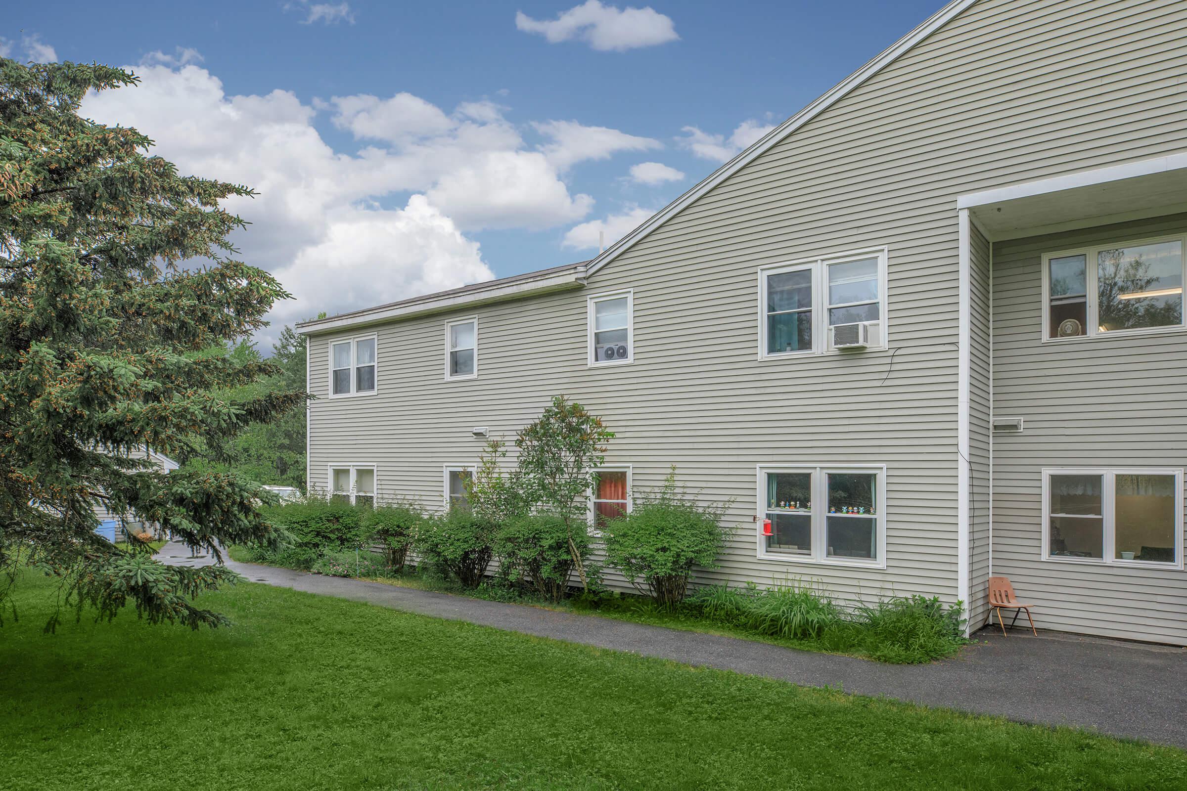 a large lawn in front of a house