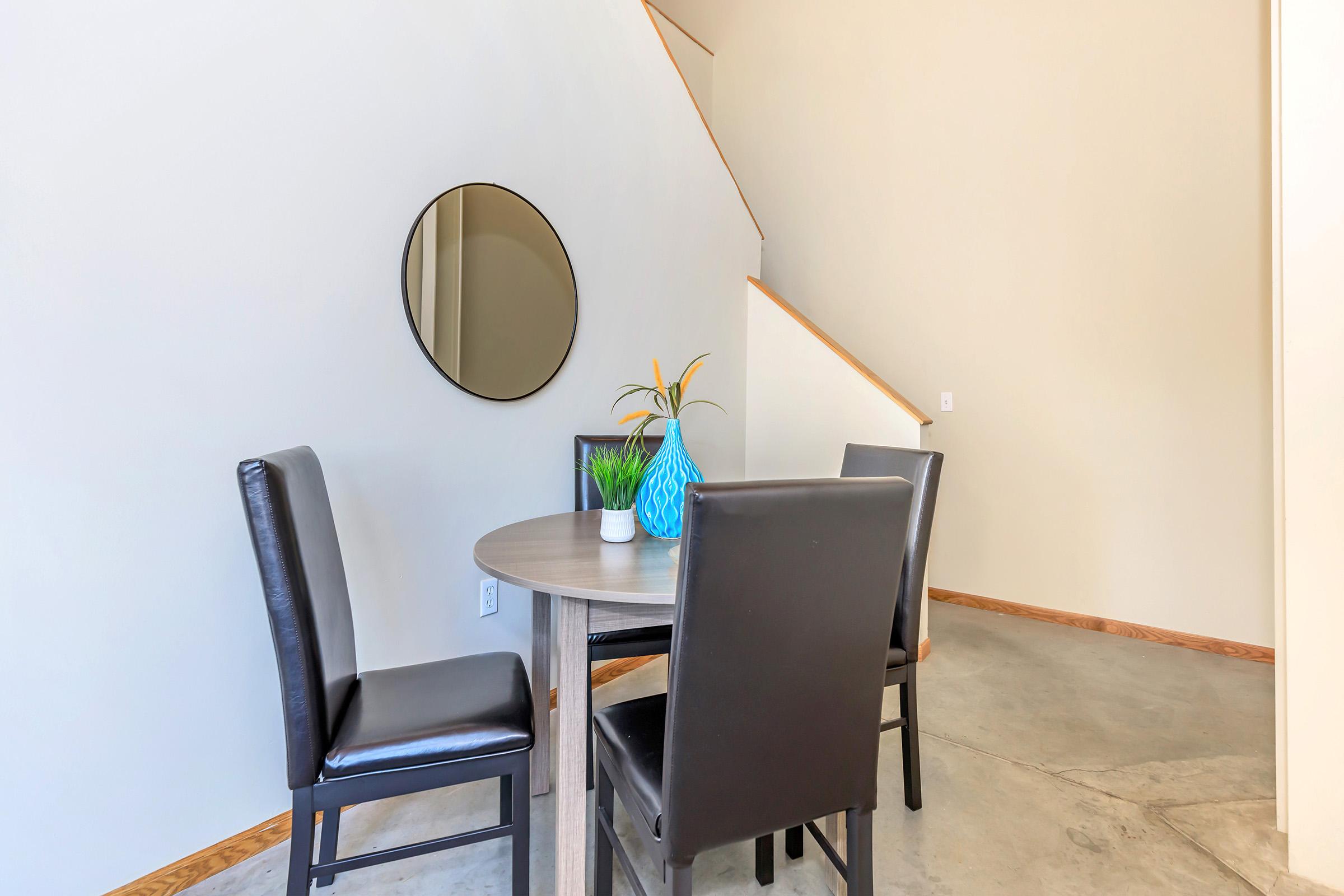 a desk with a chair in a room