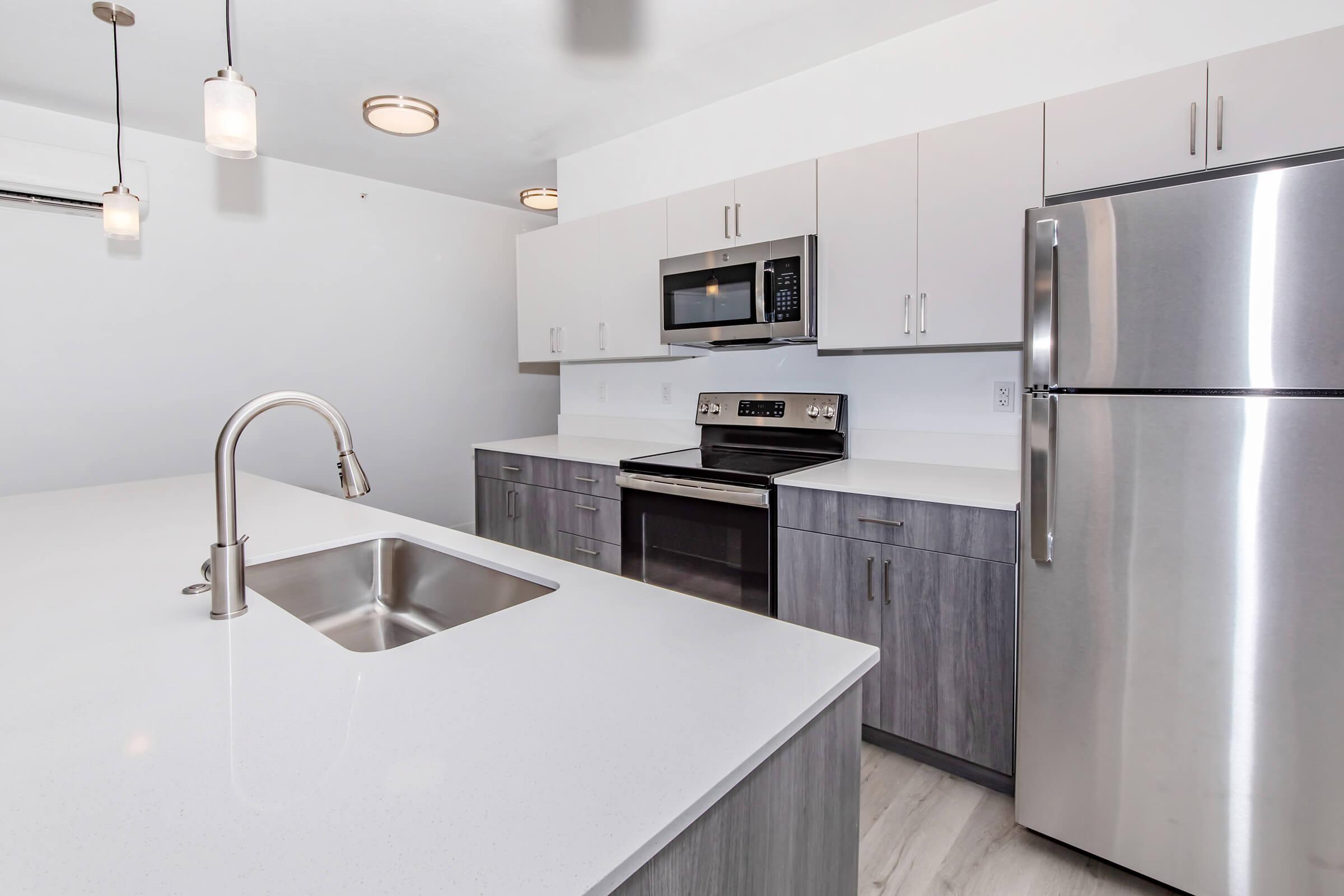 a stainless steel refrigerator in a kitchen