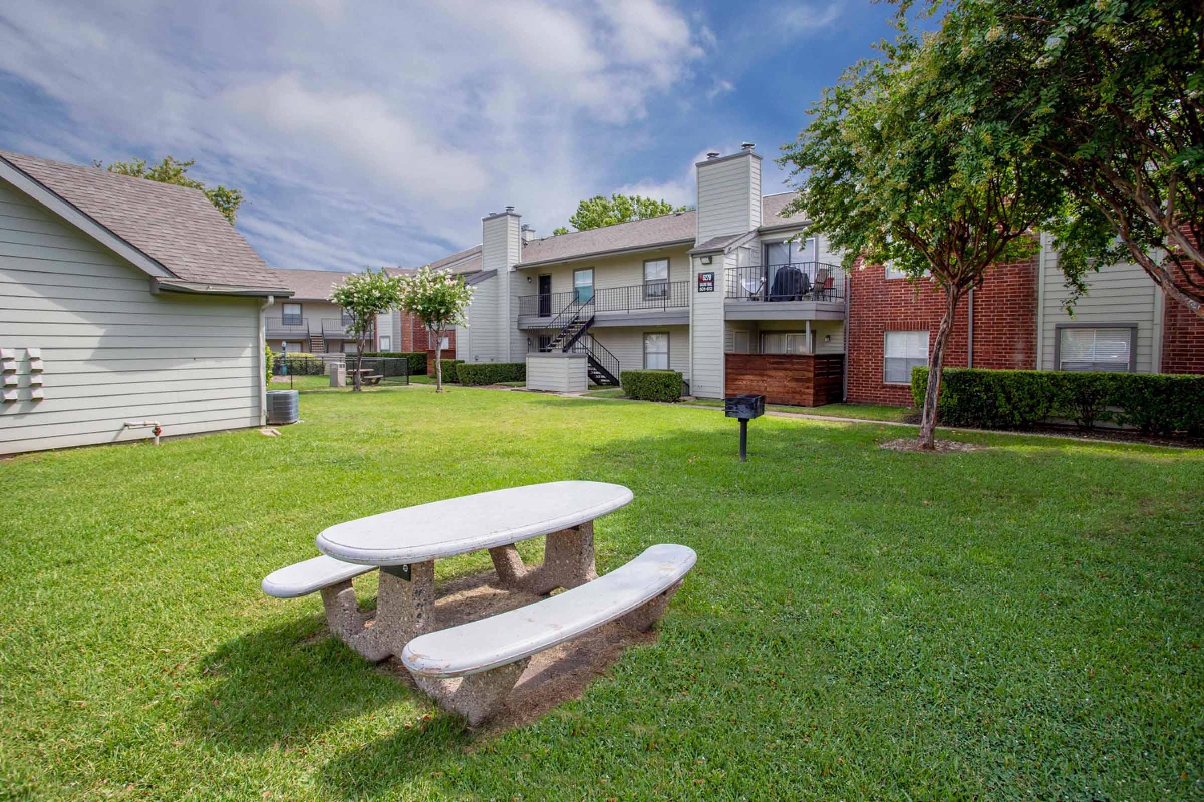 a large lawn in front of a house