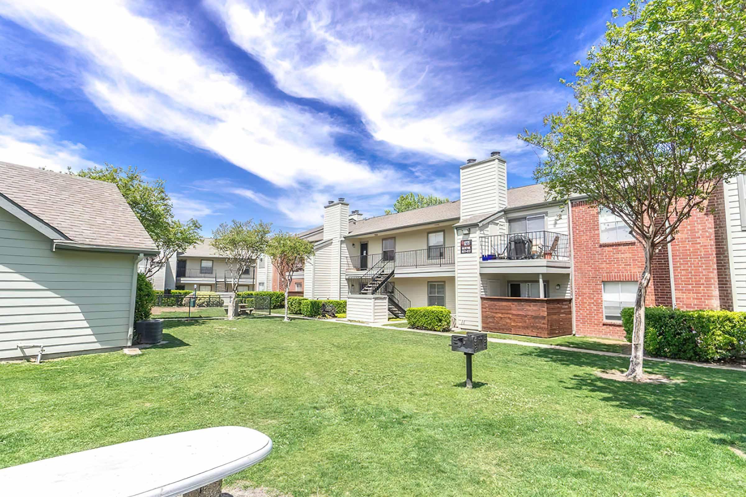 a large lawn in front of a house