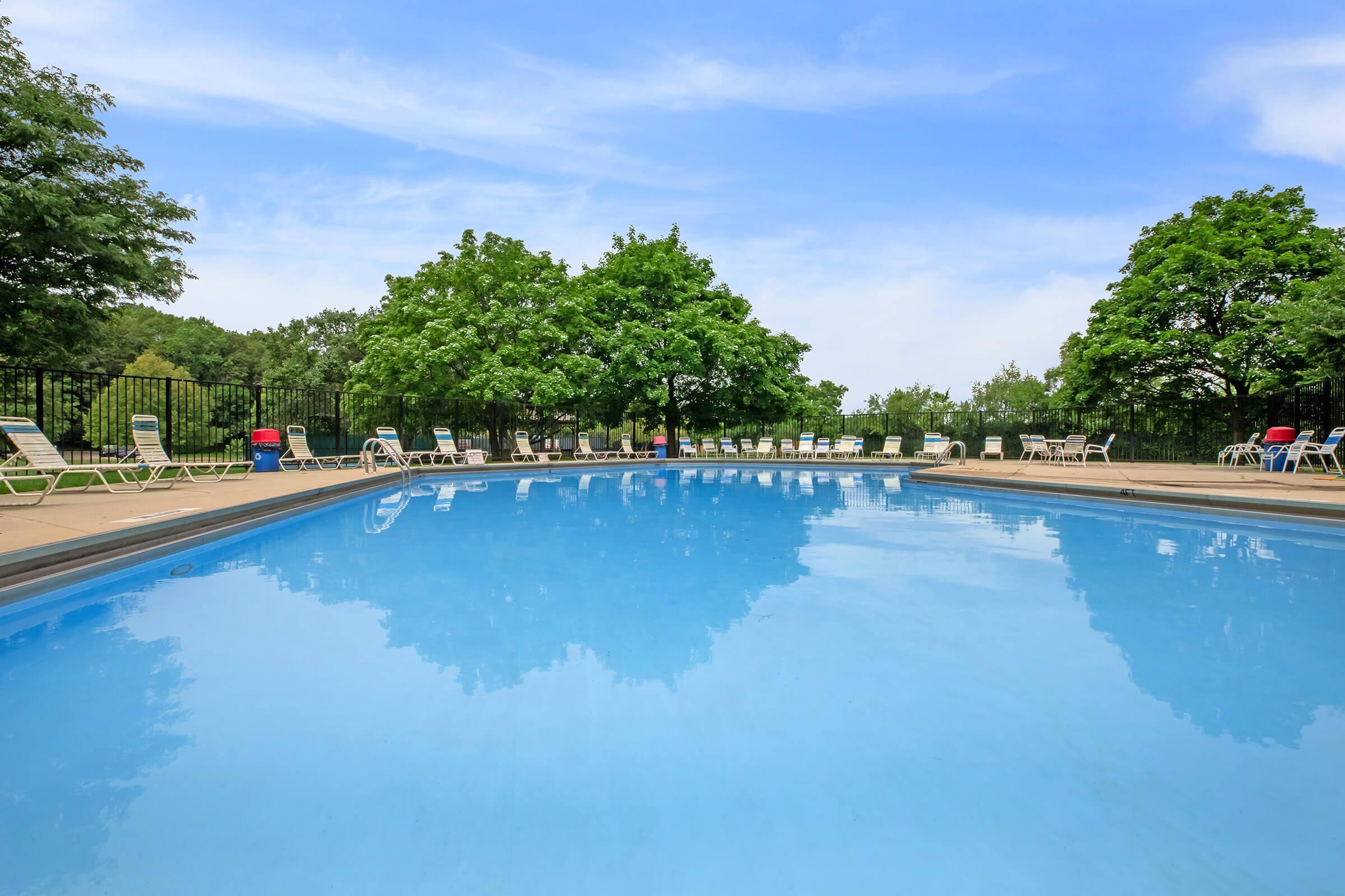 a pool next to a body of water