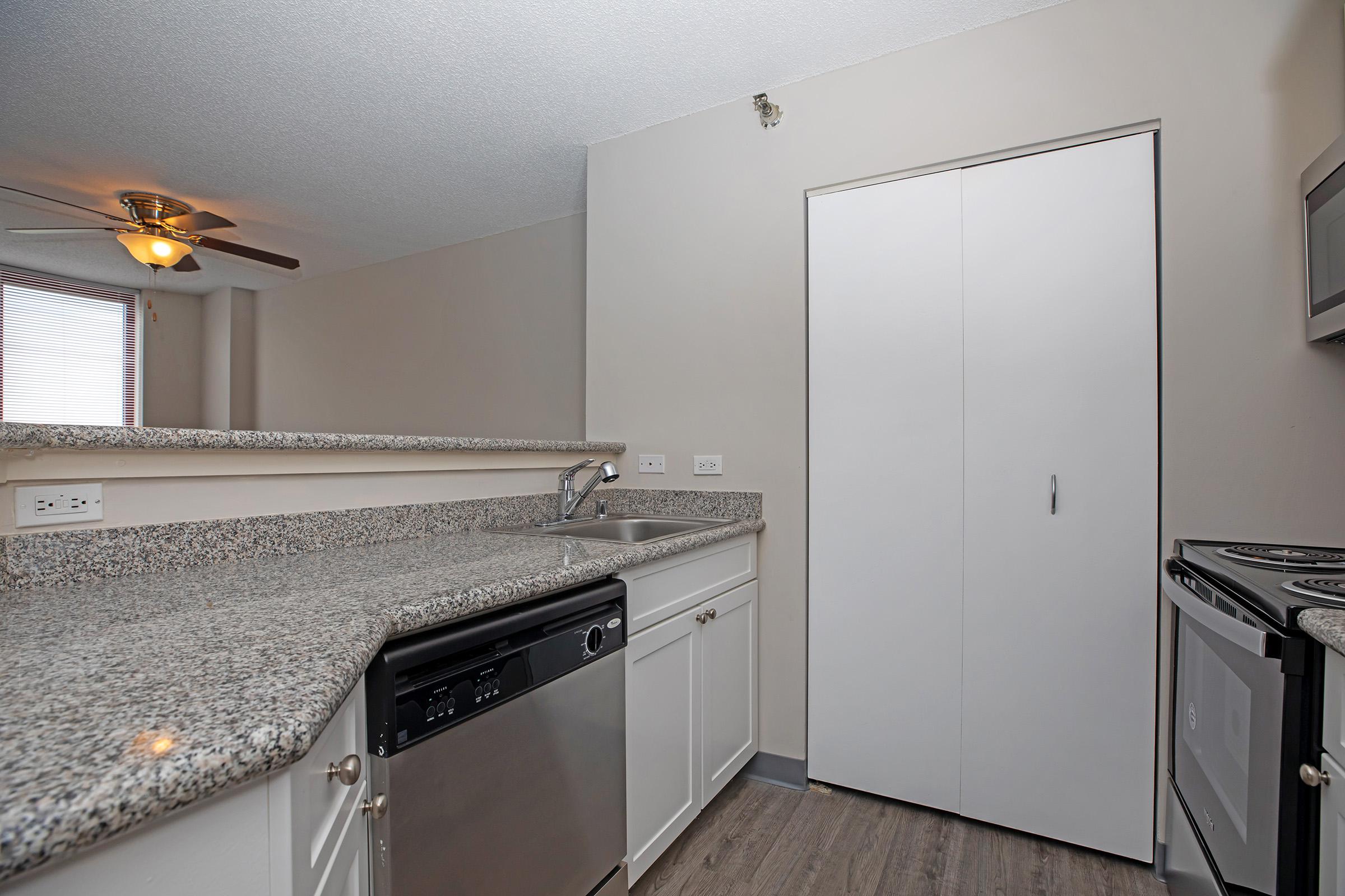 a modern kitchen with stainless steel appliances