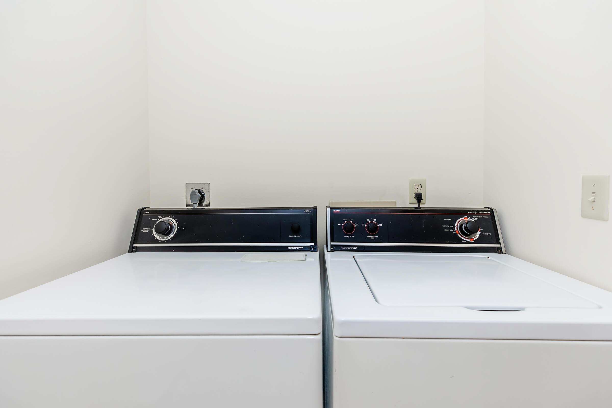 a stove top oven sitting inside of a kitchen