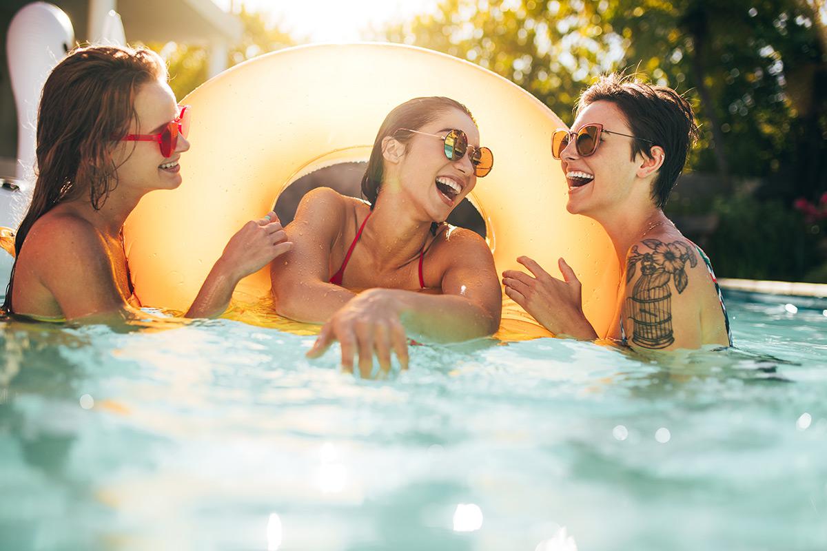 a group of people swimming in the water