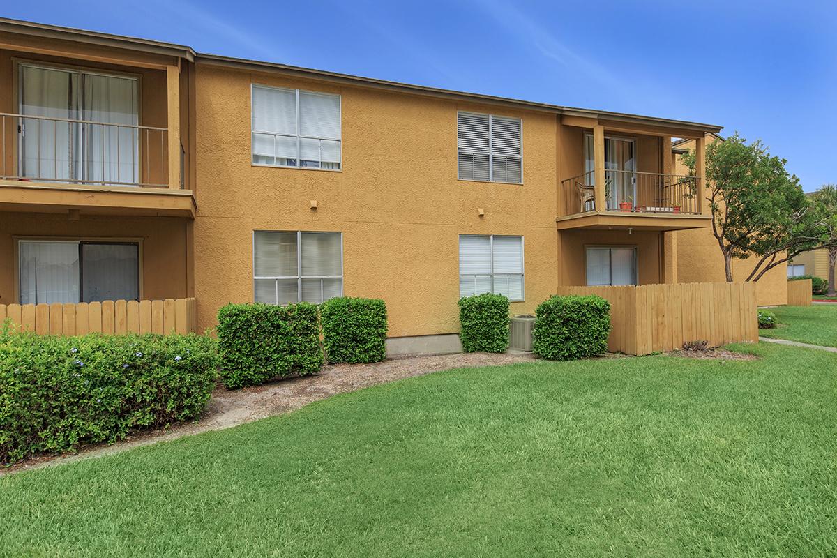 a large lawn in front of a house