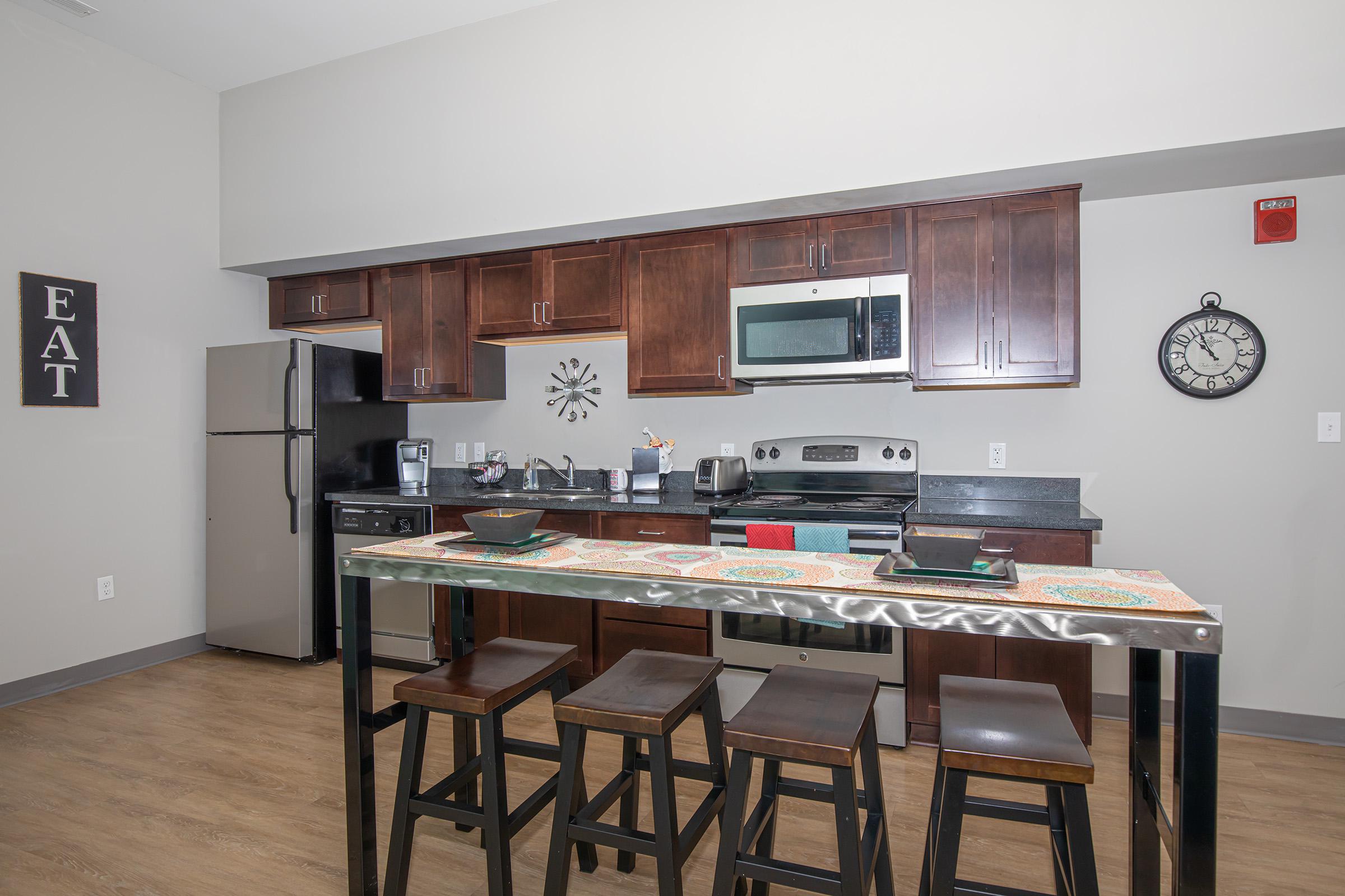 a kitchen with a dining table