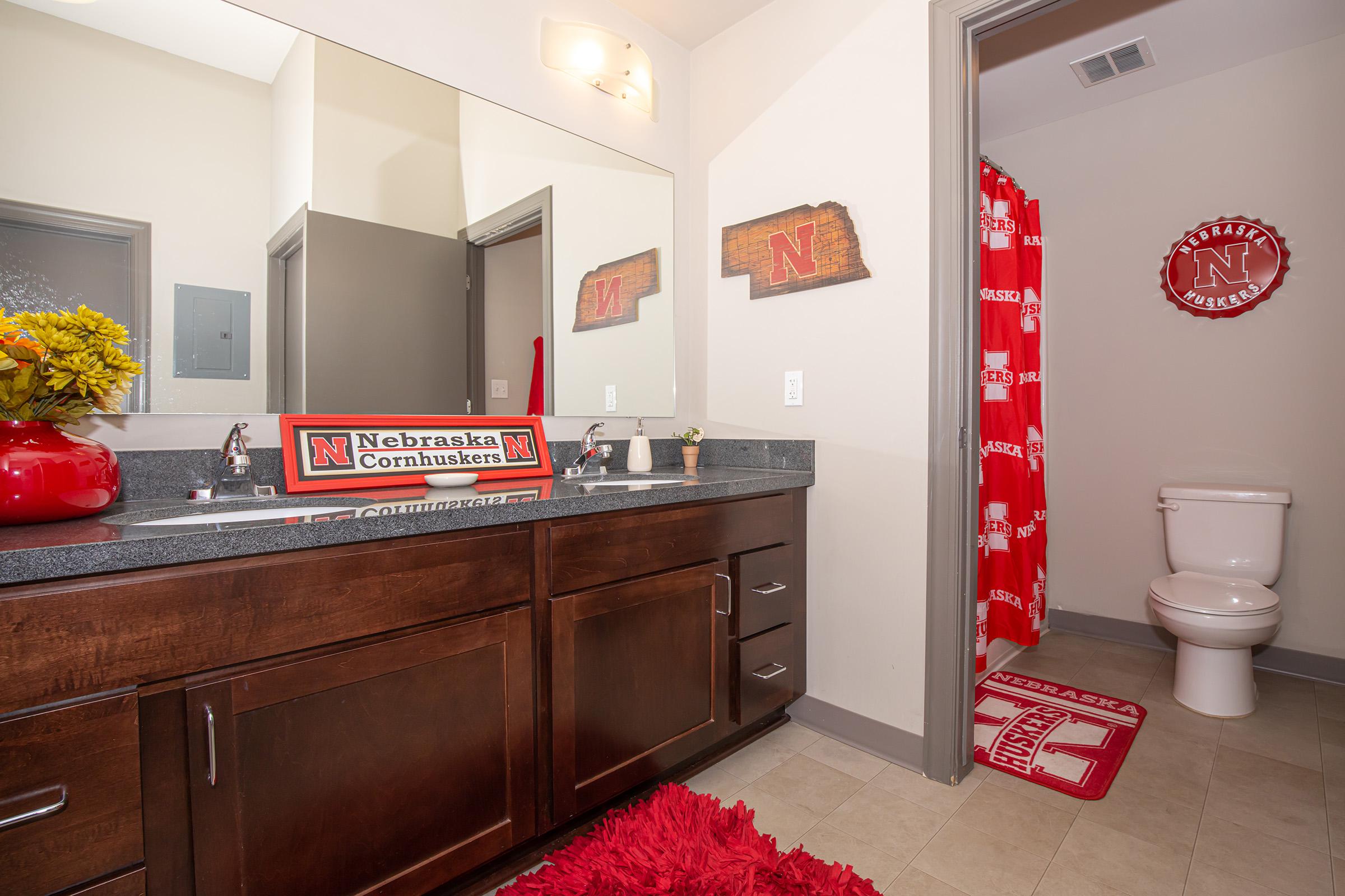 a kitchen with a sink and a refrigerator