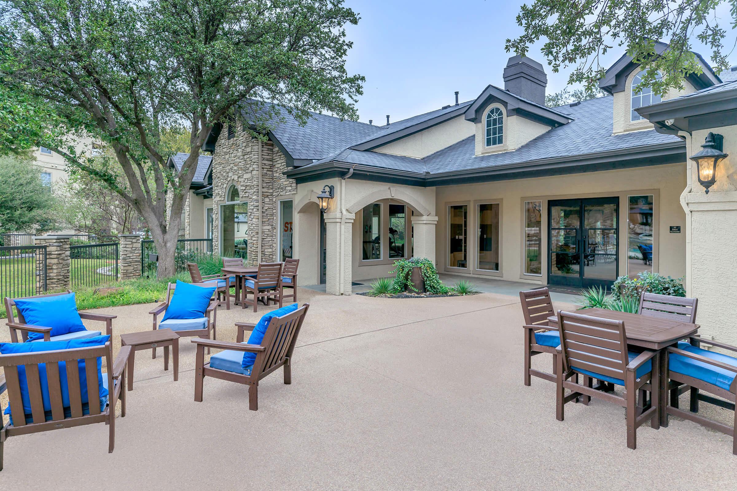 Lake Pointe community patio with blue chairs