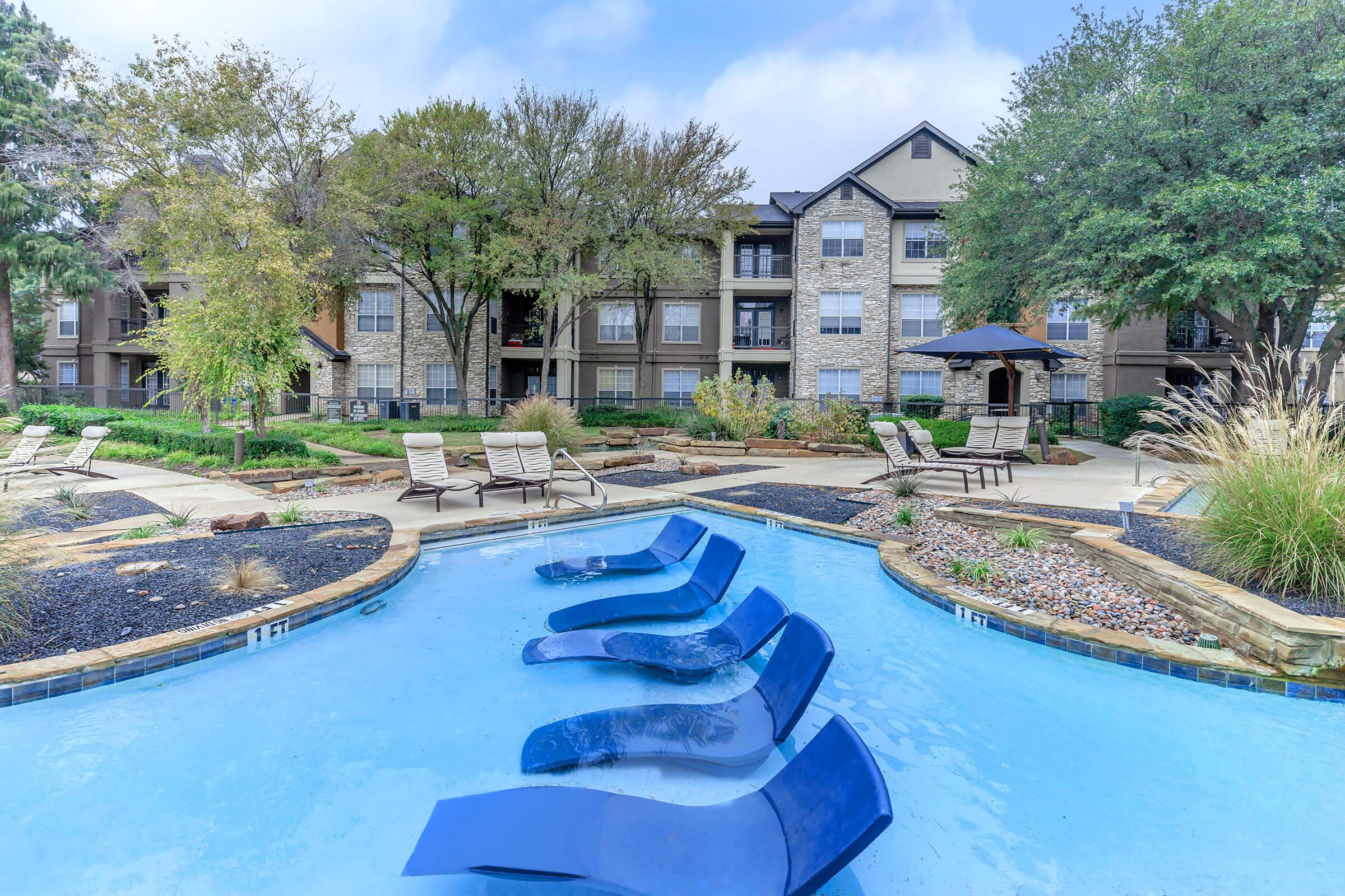 Lake Pointe community pool with in-pool loungers
