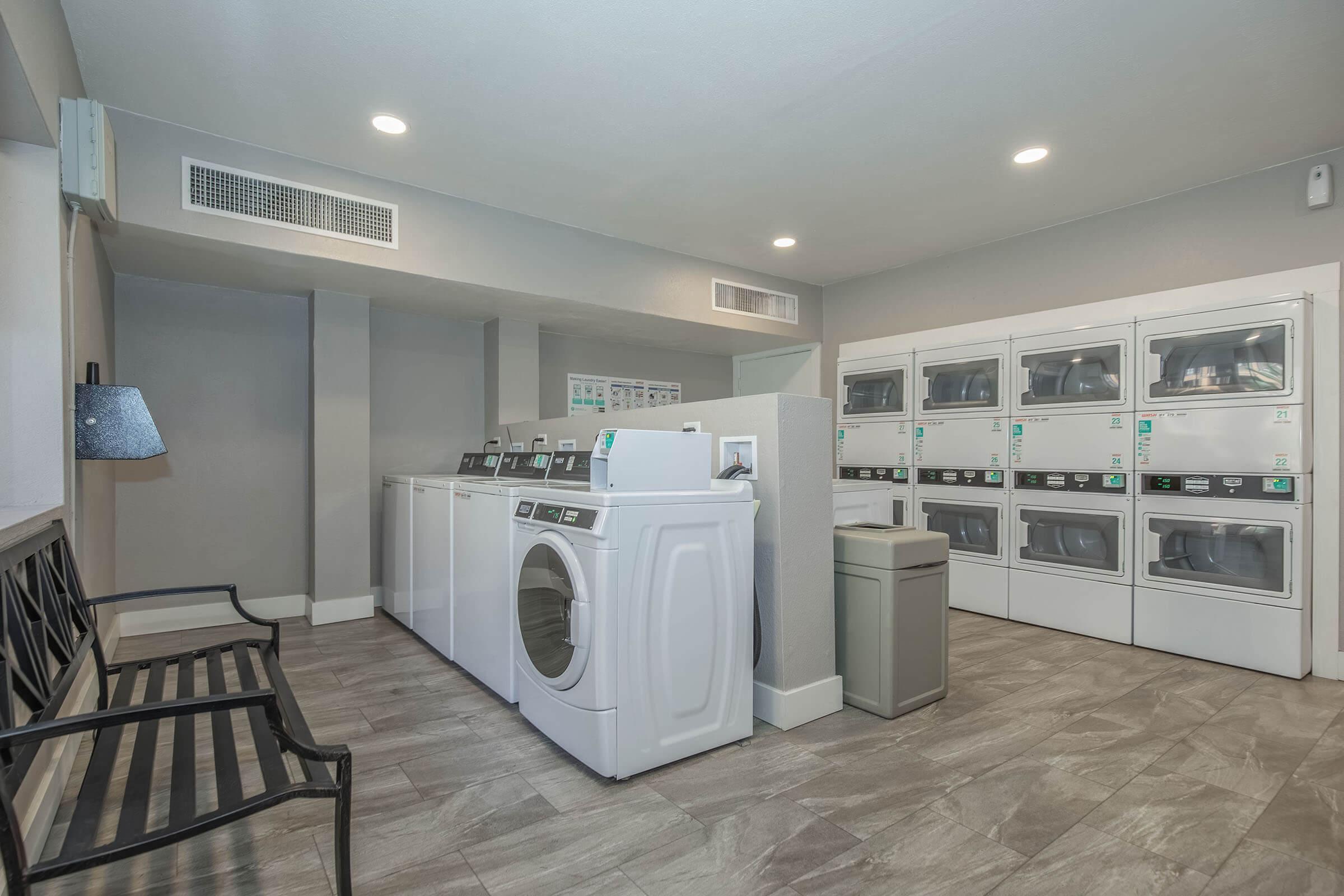 a kitchen with a refrigerator in a room