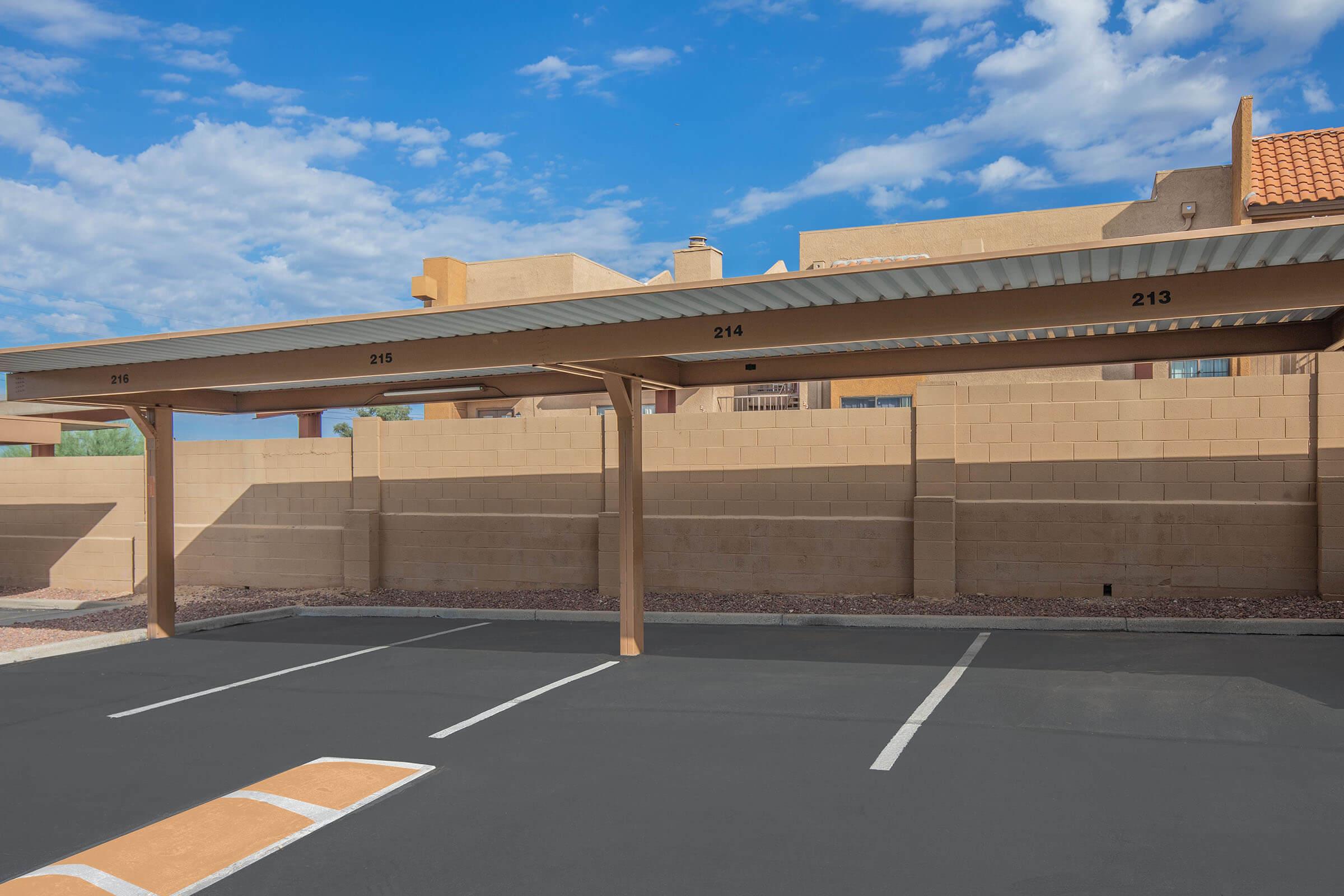 an empty parking lot in front of a building