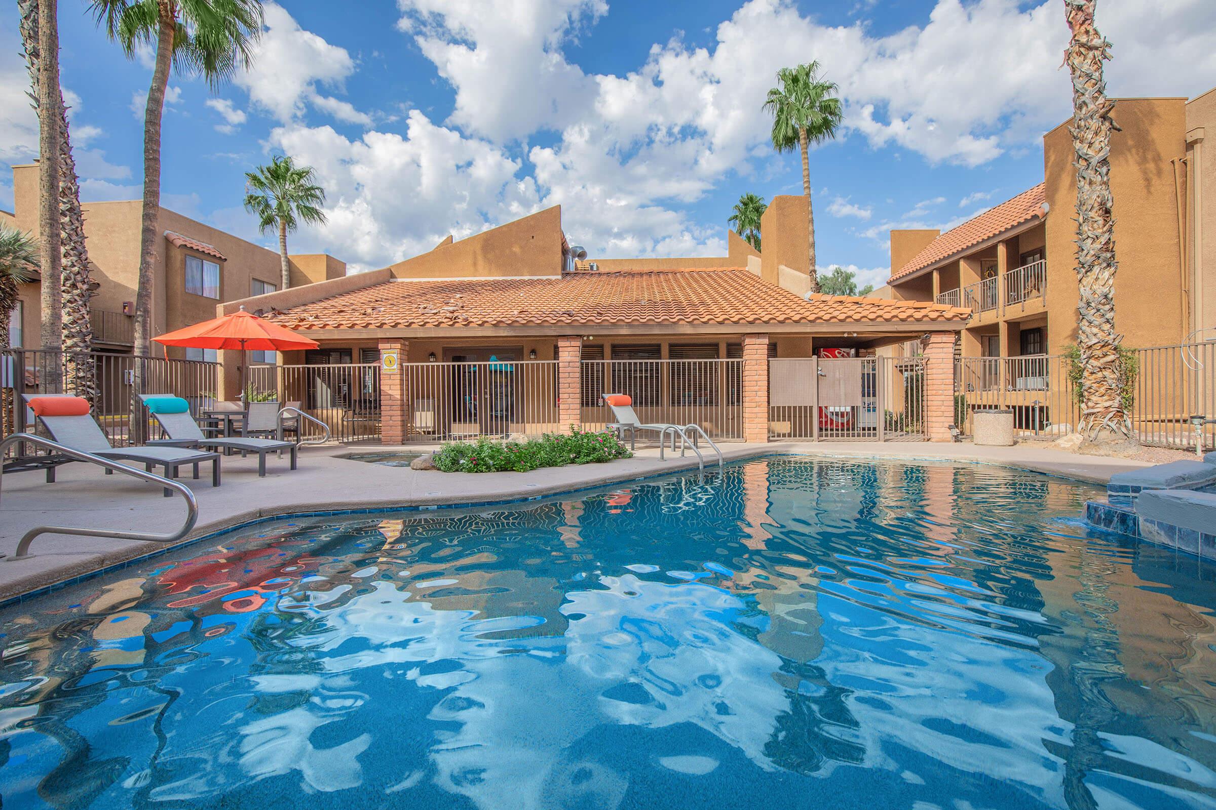 a house with a large pool of water