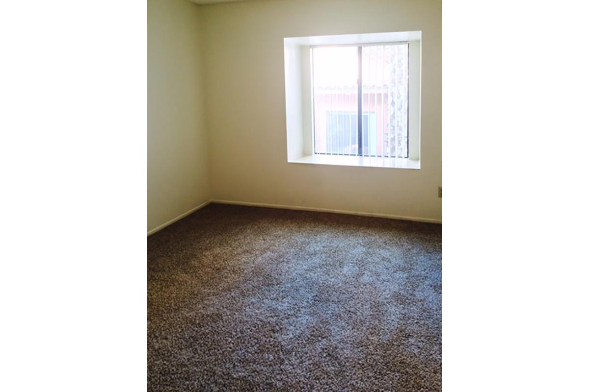 a view of a tiled floor next to a window