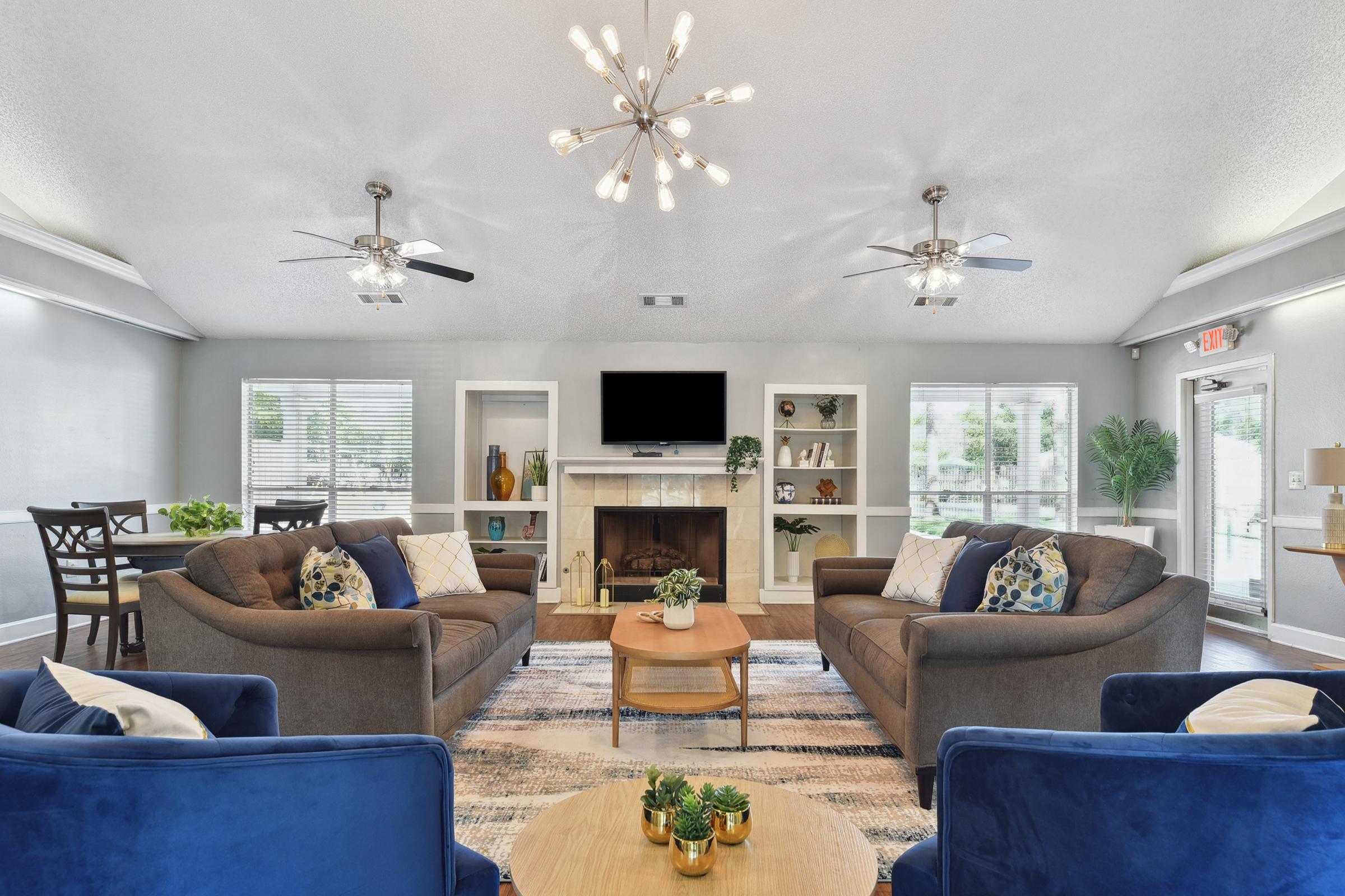 a living room filled with furniture and vase on a table