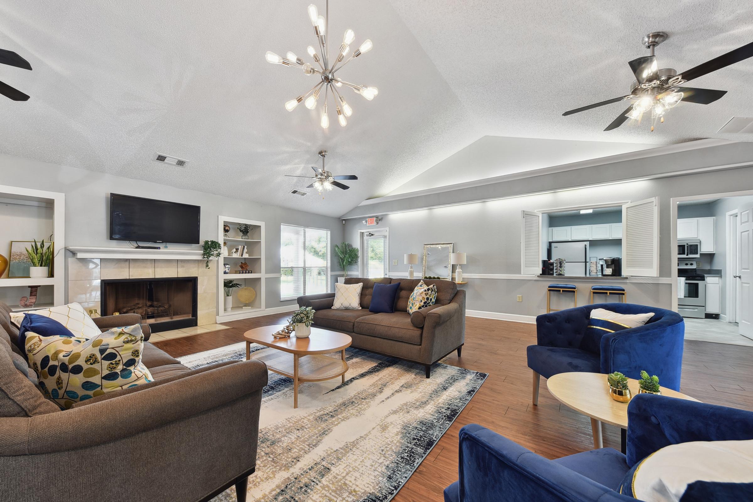 a living room filled with lots of furniture