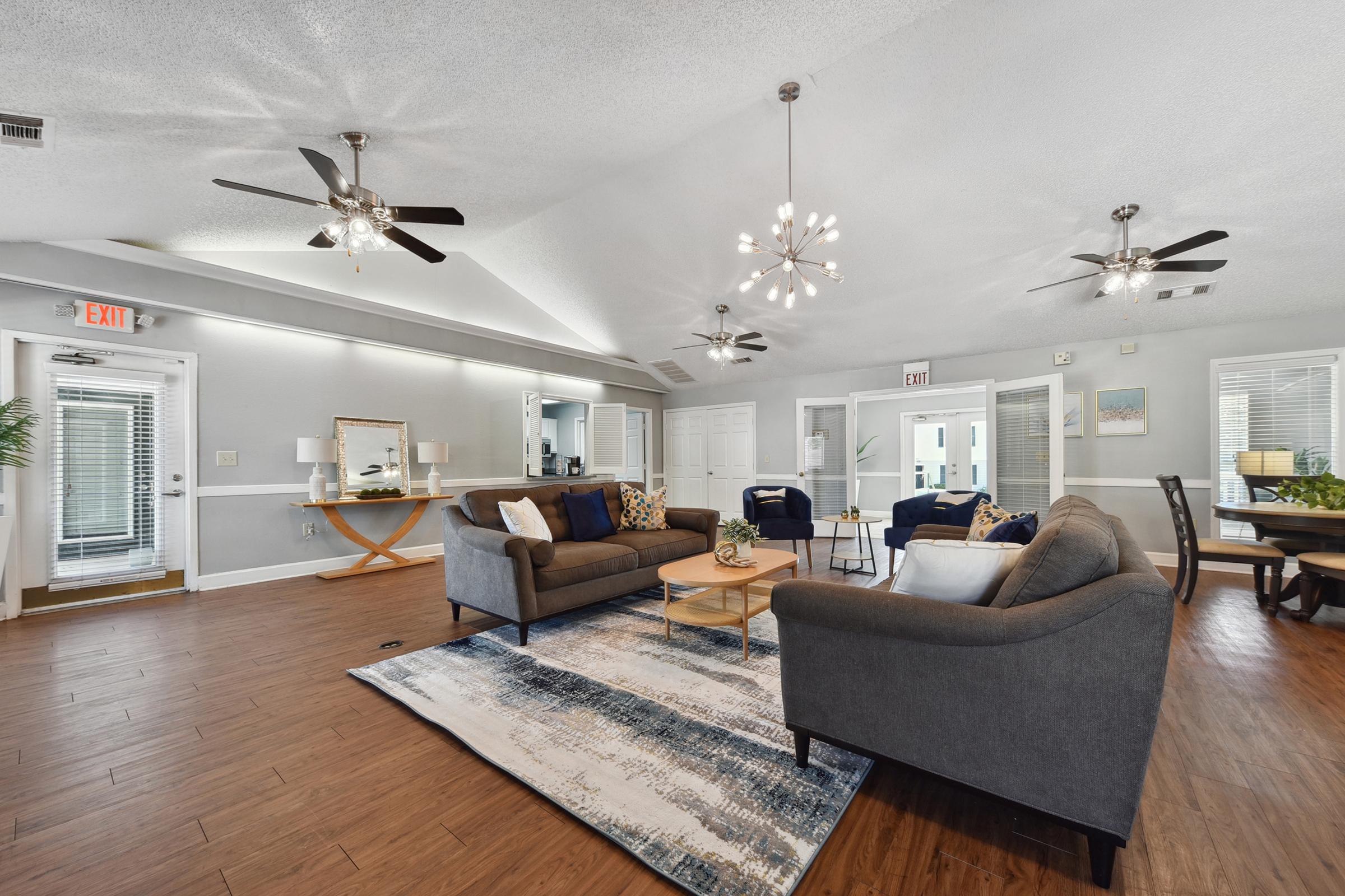 a living room with a wooden floor