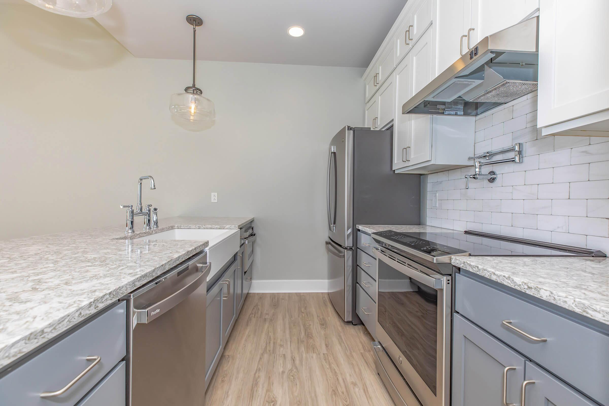 a kitchen with stainless steel appliances