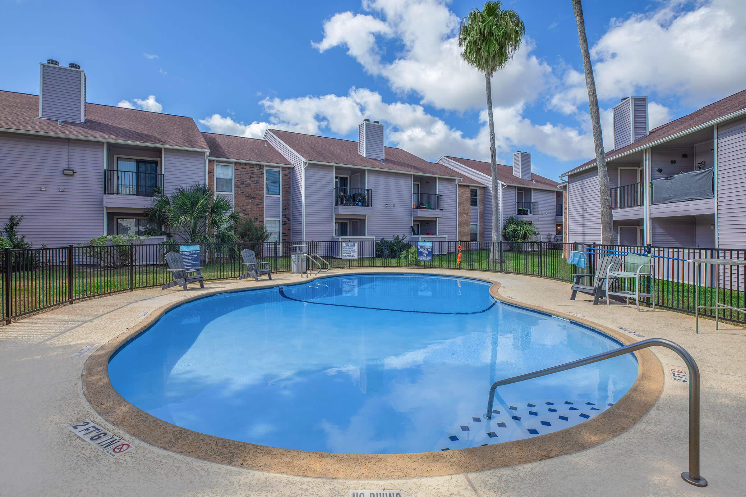 a pool next to a building