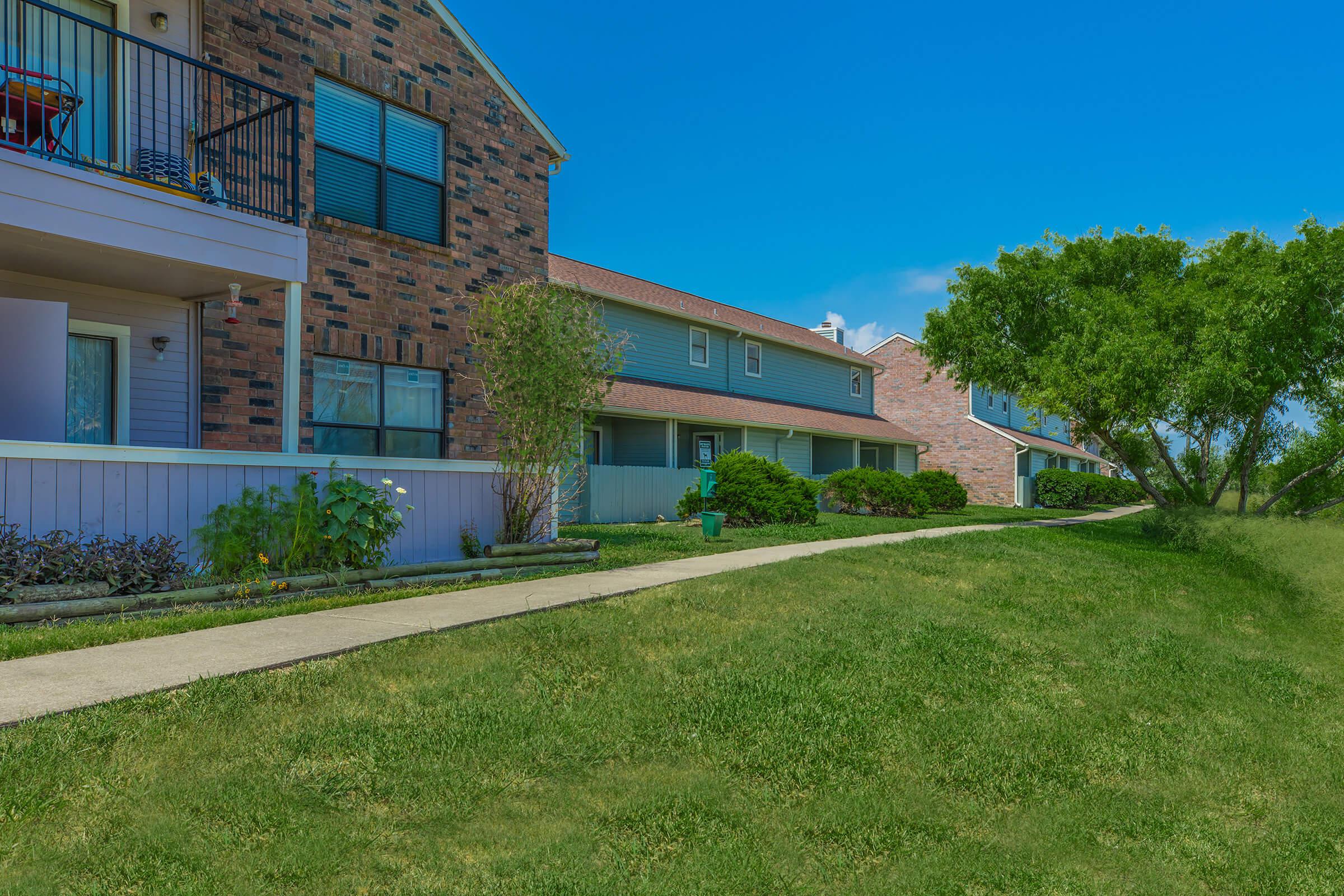 a large lawn in front of a building