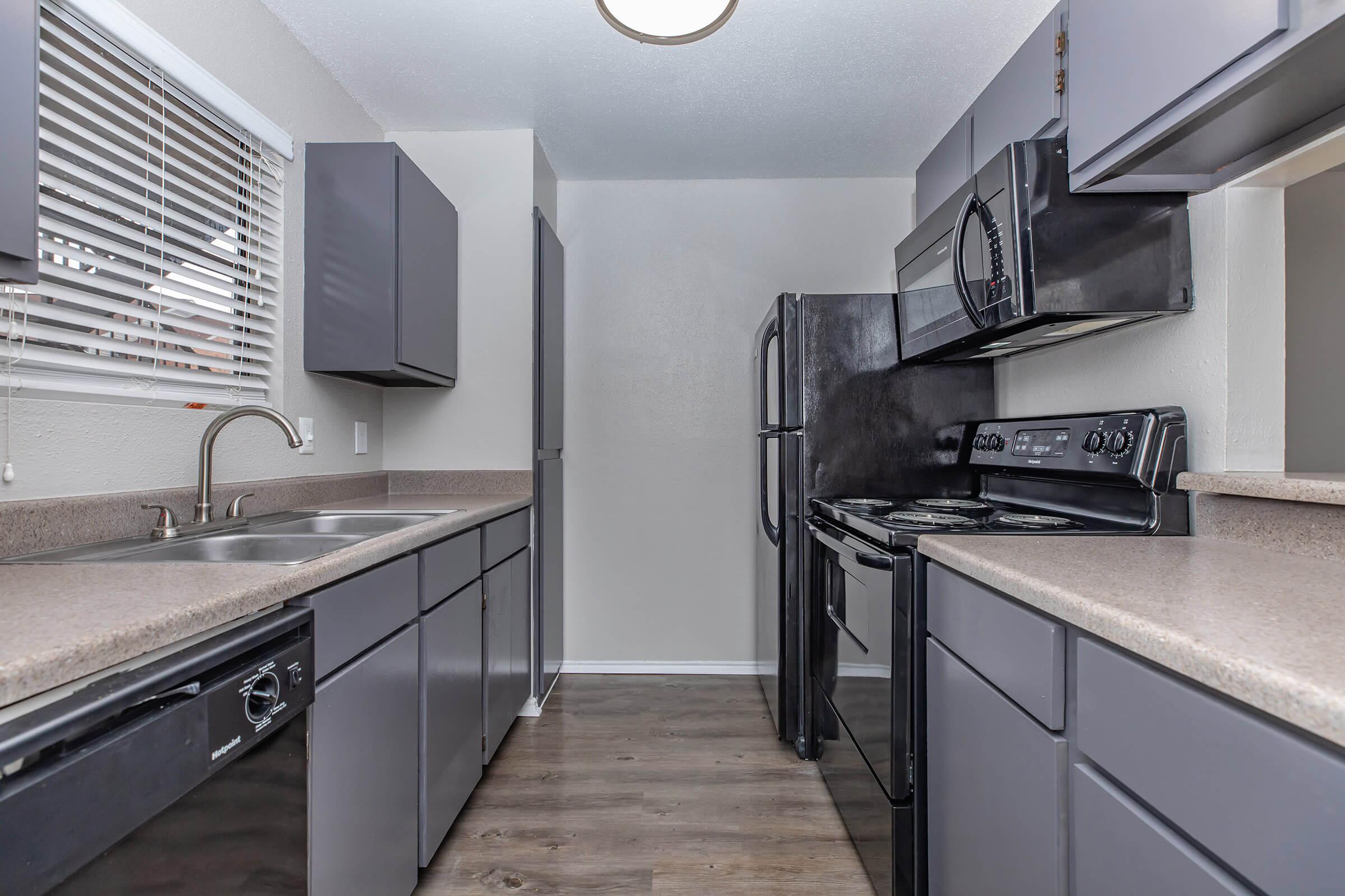 a modern kitchen with stainless steel appliances