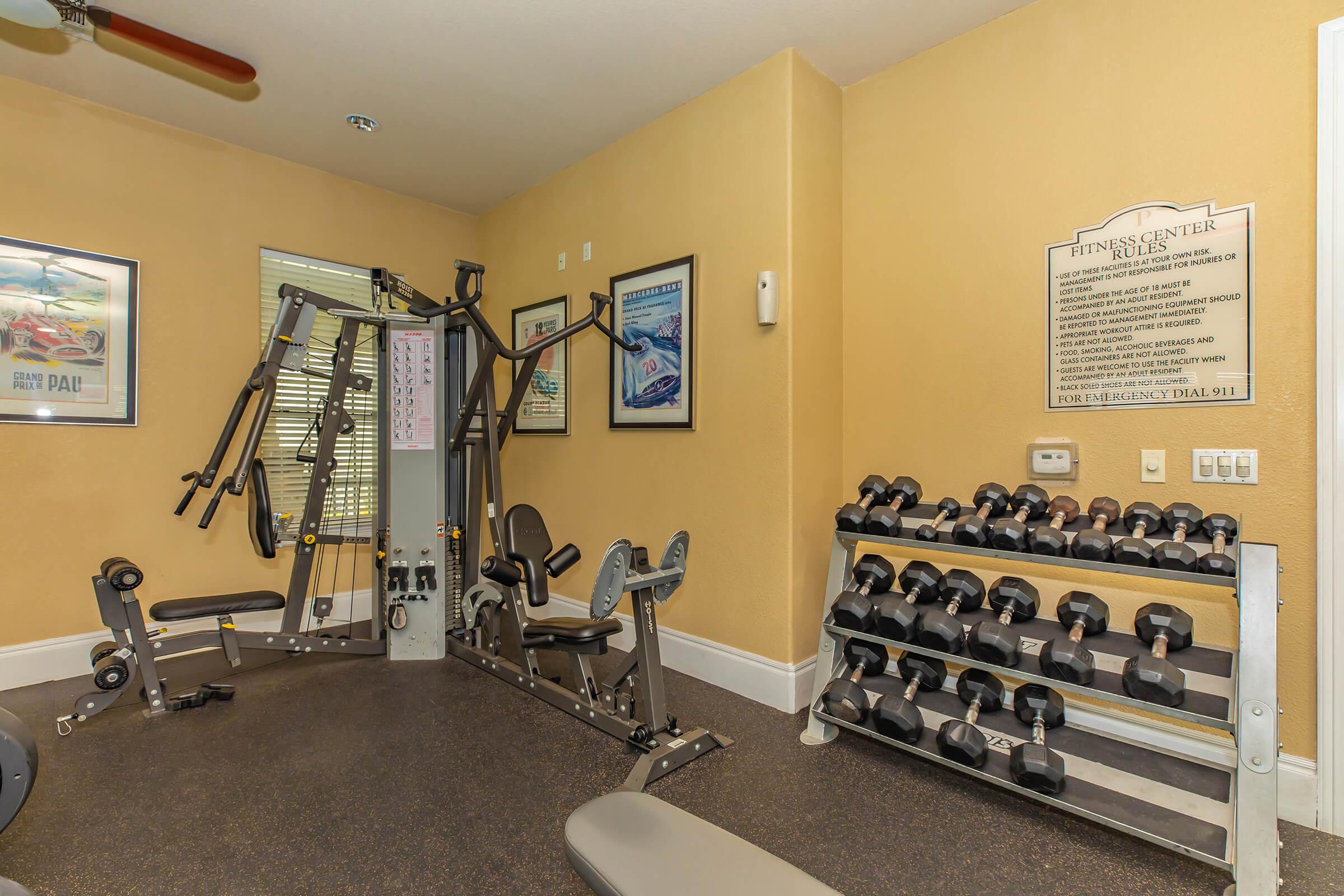 LIFT FREE WEIGHTS IN THE FITNESS CENTER