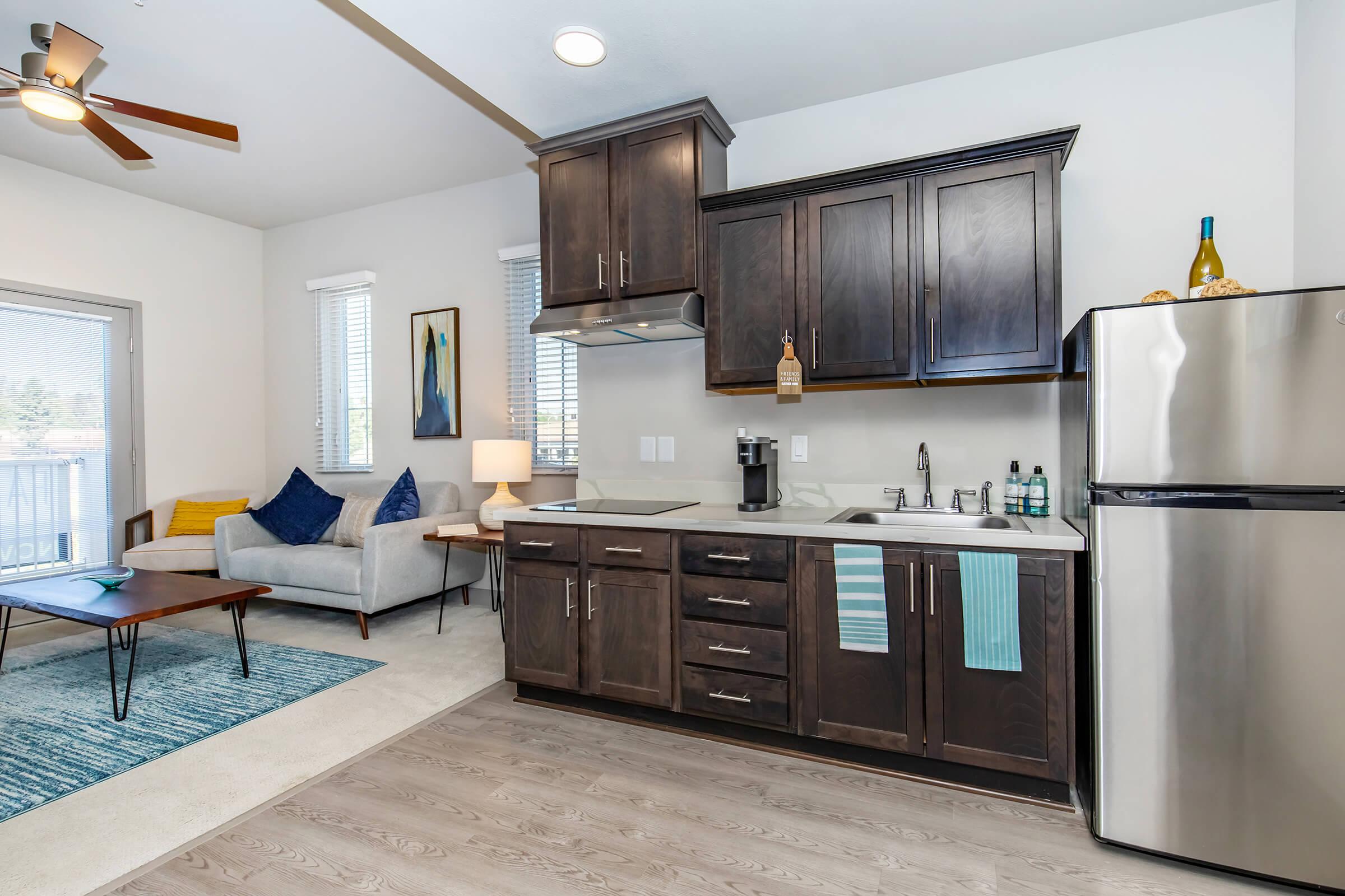 a kitchen with a table in a room